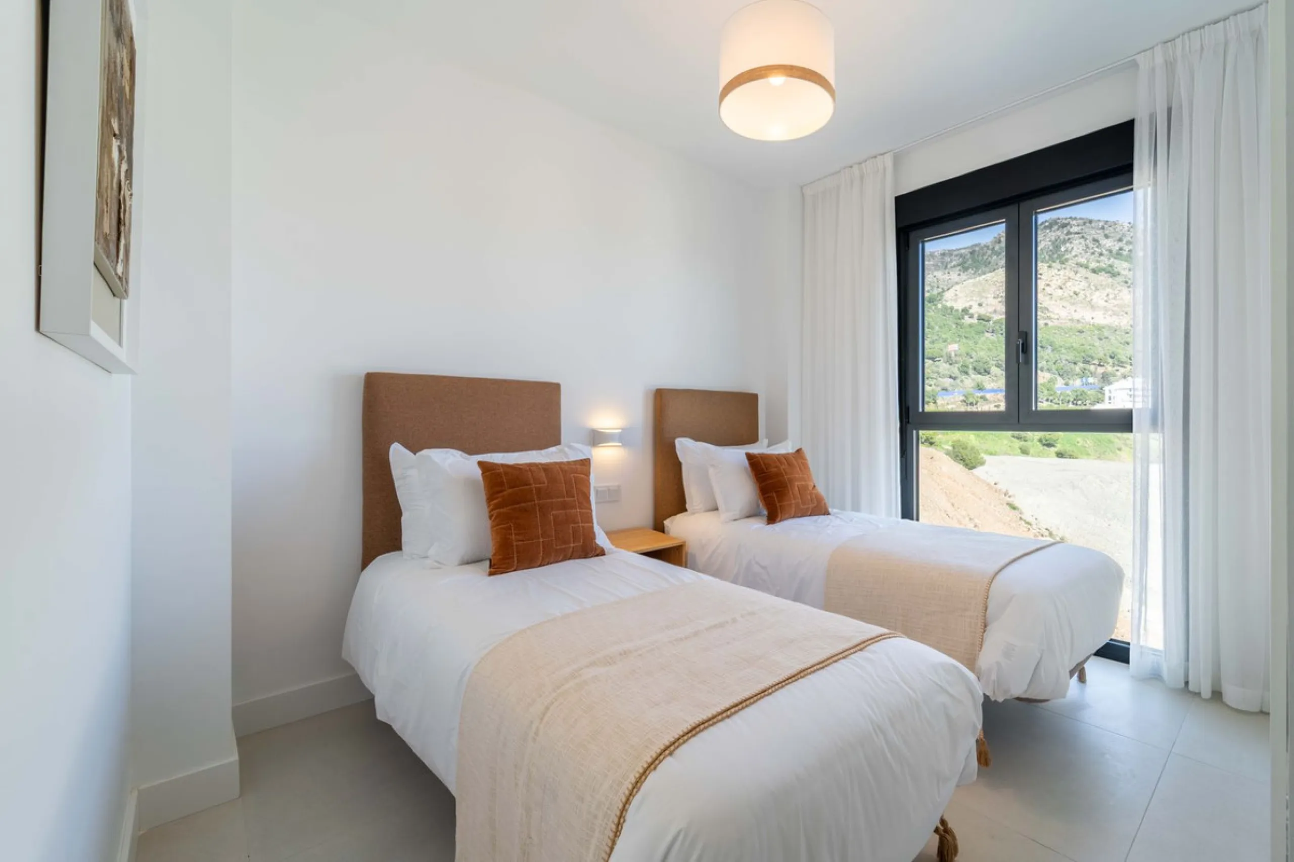 Modern three-bedroom apartment with panoramic sea views in an elevated position on the Costa del Sol.