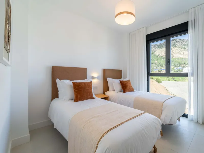 Modern three-bedroom apartment with panoramic sea views in an elevated position on the Costa del Sol.