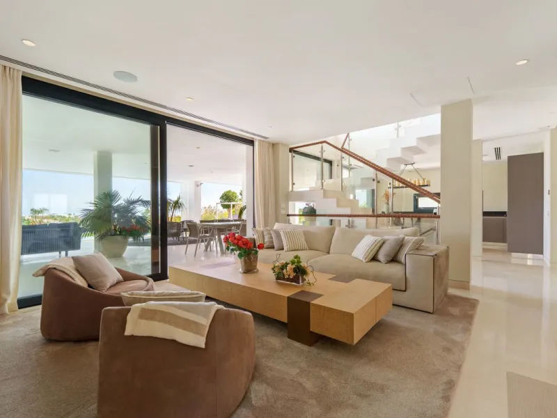 A striking contemporary villa in the heart of Nueva Andalucía, enjoying a privileged frontline golf position. With clean architectural lines, expansive terraces, and floor-to-ceiling windows, this home is designed to maximize natural light and uninterrupt