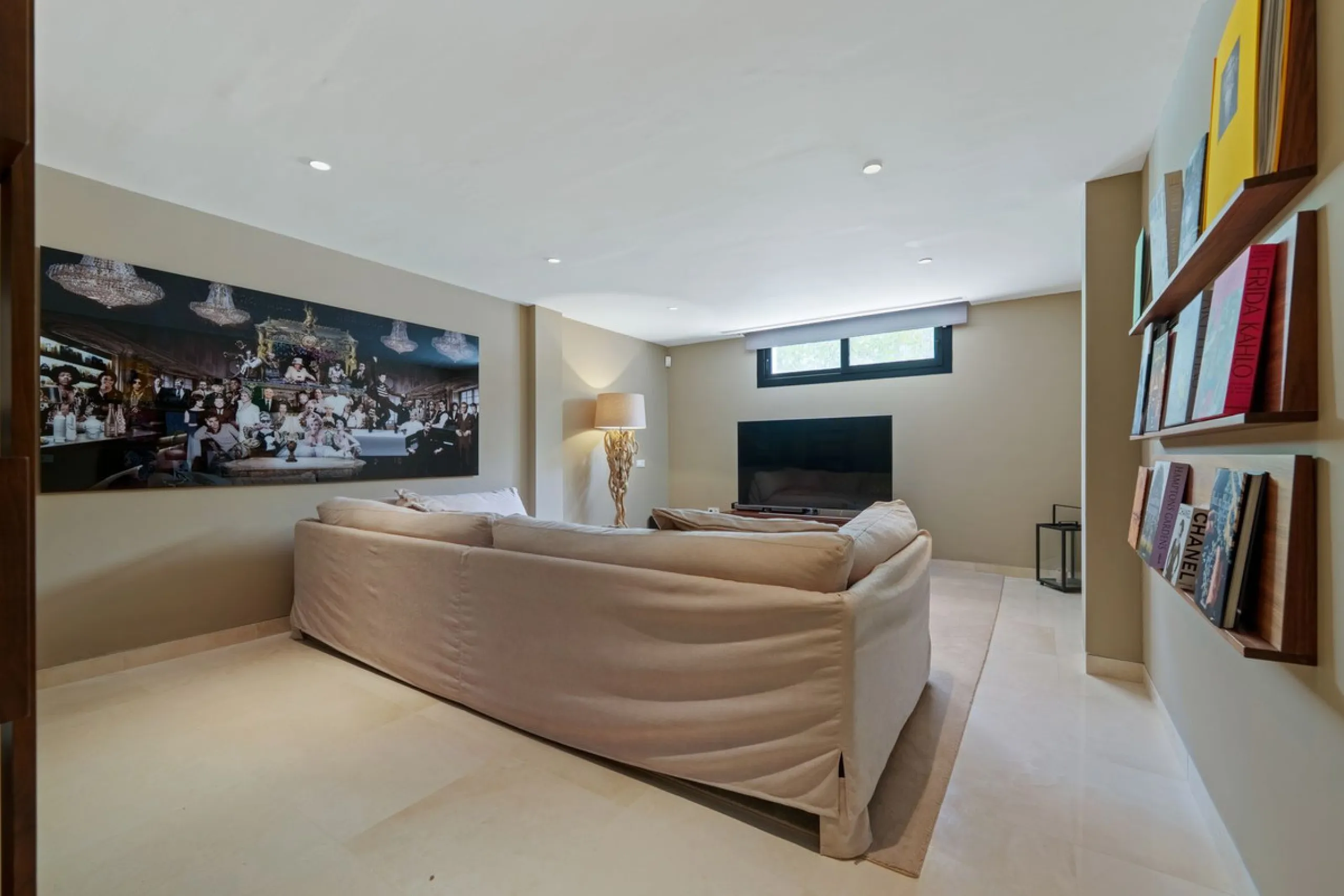 A striking contemporary villa in the heart of Nueva Andalucía, enjoying a privileged frontline golf position. With clean architectural lines, expansive terraces, and floor-to-ceiling windows, this home is designed to maximize natural light and uninterrupt