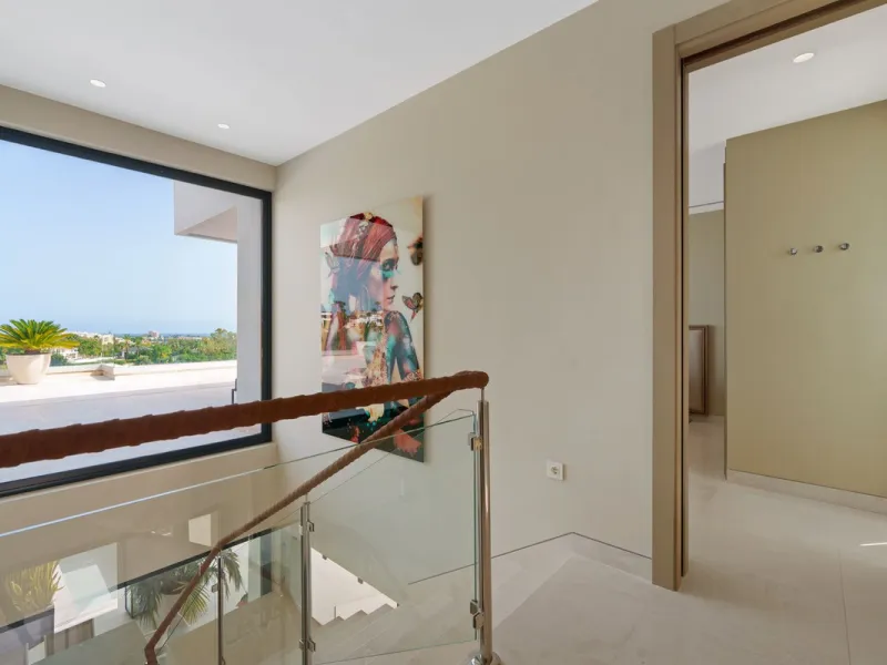 A striking contemporary villa in the heart of Nueva Andalucía, enjoying a privileged frontline golf position. With clean architectural lines, expansive terraces, and floor-to-ceiling windows, this home is designed to maximize natural light and uninterrupt