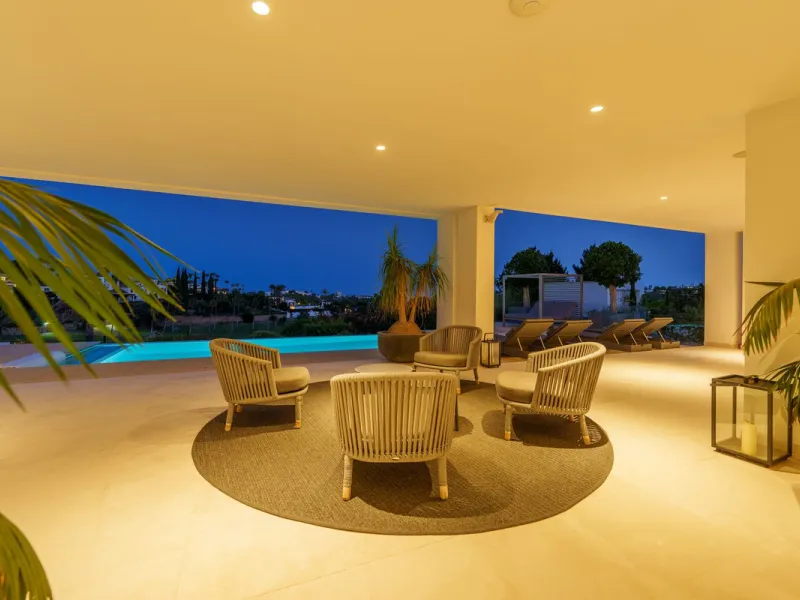 A striking contemporary villa in the heart of Nueva Andalucía, enjoying a privileged frontline golf position. With clean architectural lines, expansive terraces, and floor-to-ceiling windows, this home is designed to maximize natural light and uninterrupt