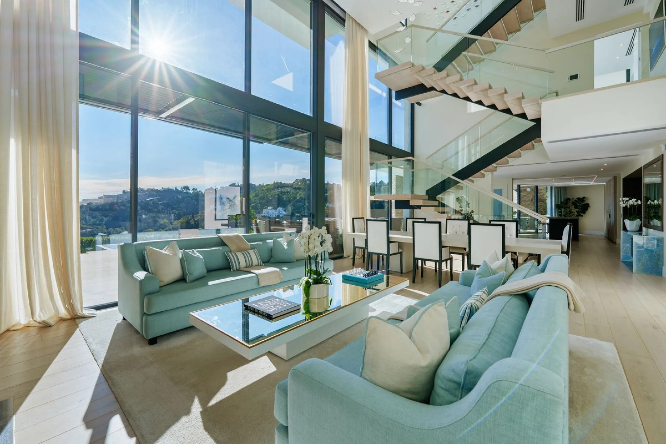 A five-bedroom villa in the urbanisation, Benahavís, offering five bathrooms plus a guest cloakroom, with a first floor dedicated to the master suite with dressing room and library alongside a guest ensuite, a ground floor arranged around formal and infor