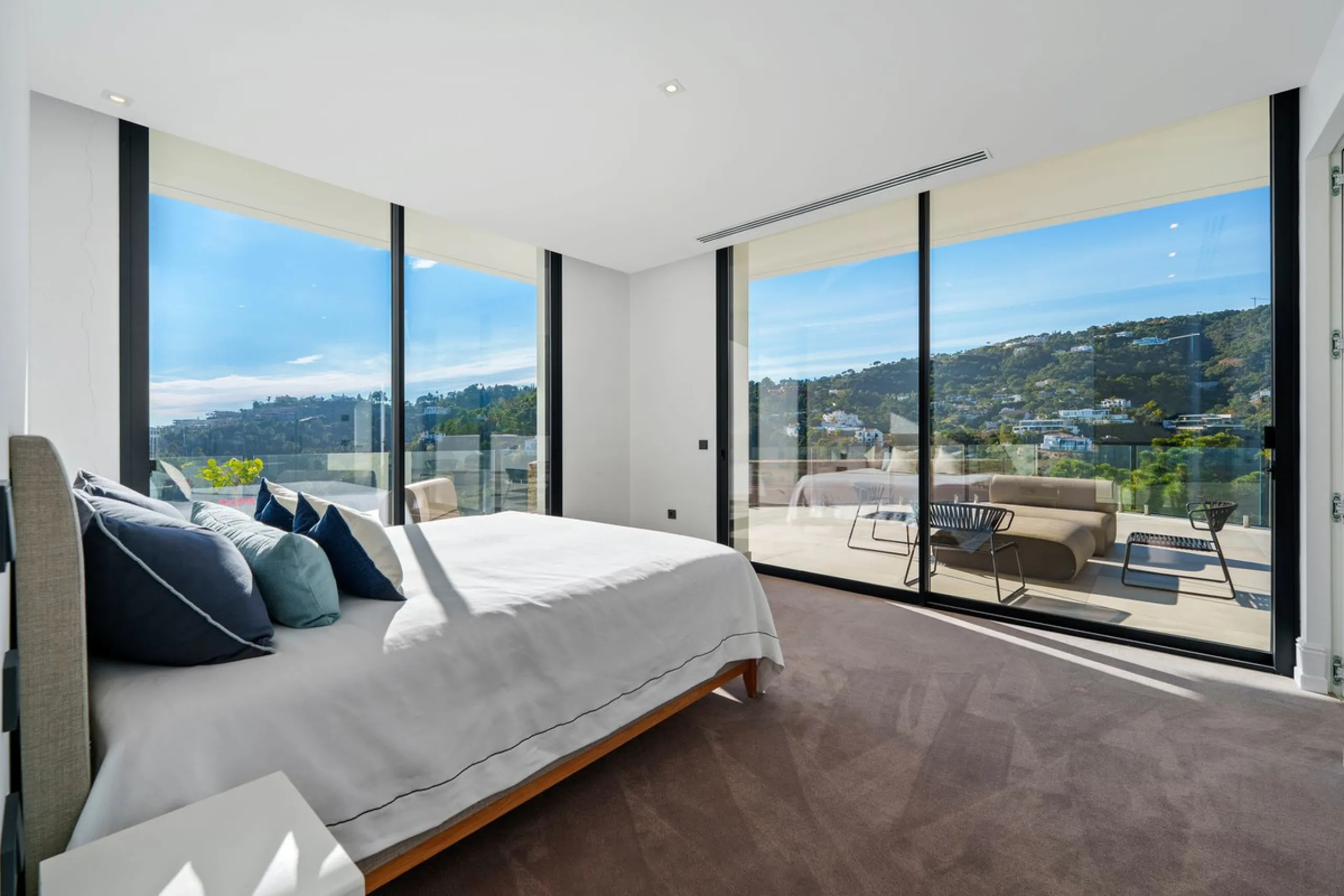 A five-bedroom villa in the urbanisation, Benahavís, offering five bathrooms plus a guest cloakroom, with a first floor dedicated to the master suite with dressing room and library alongside a guest ensuite, a ground floor arranged around formal and infor
