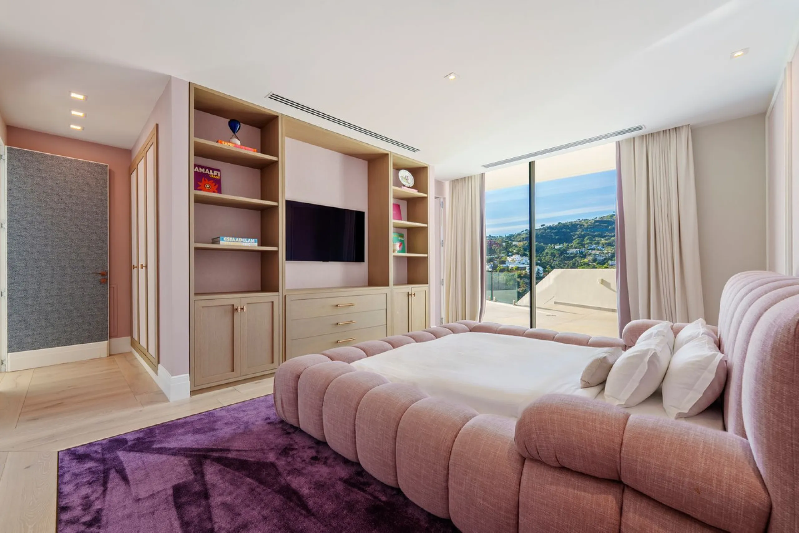 A five-bedroom villa in the urbanisation, Benahavís, offering five bathrooms plus a guest cloakroom, with a first floor dedicated to the master suite with dressing room and library alongside a guest ensuite, a ground floor arranged around formal and infor