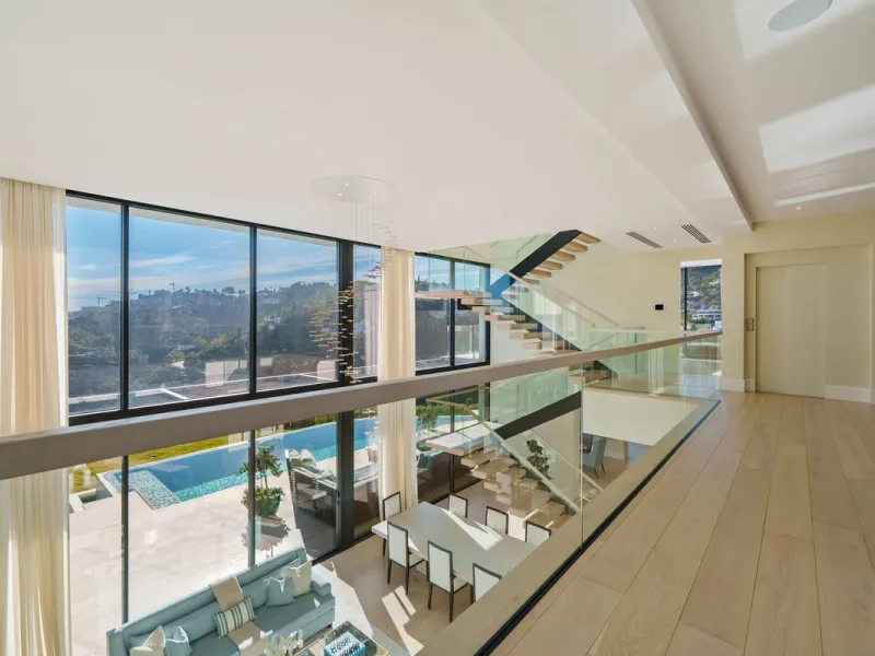 A five-bedroom villa in the urbanisation, Benahavís, offering five bathrooms plus a guest cloakroom, with a first floor dedicated to the master suite with dressing room and library alongside a guest ensuite, a ground floor arranged around formal and infor