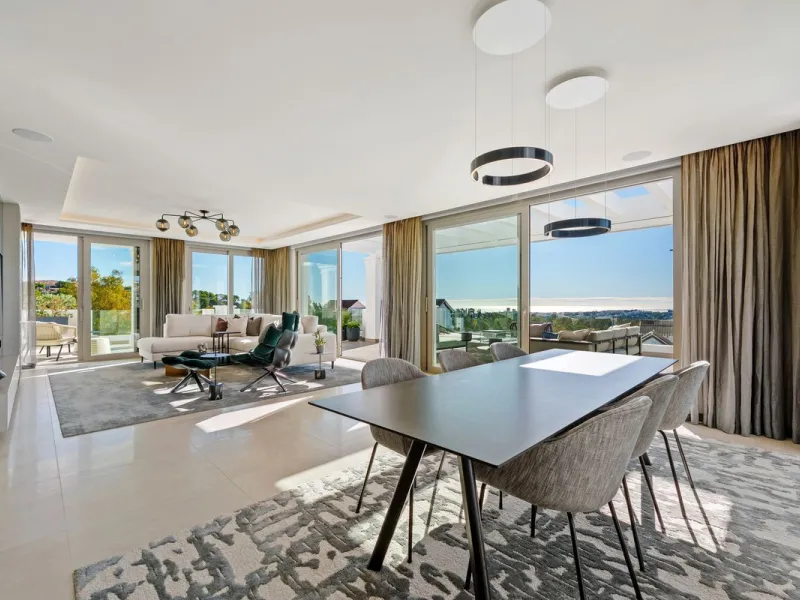 This exceptional duplex penthouse is located within an exclusive gated community in Aloha, one of the most prestigious residential developments in Nueva Andalucía. Set in an elevated position, the property enjoys panoramic open views across the surroundin