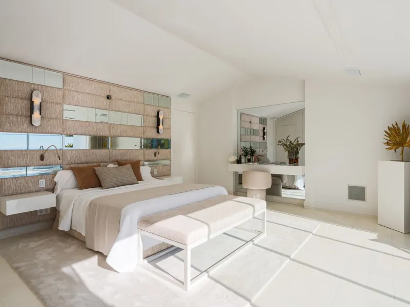 A semi-detached villa in the urbanisation, four bedrooms, four bathrooms, arranged with intent rather than habit: basement level below, an entrance floor with three en-suite bedrooms and a calm water feature setting the tone, a first floor dedicated entir