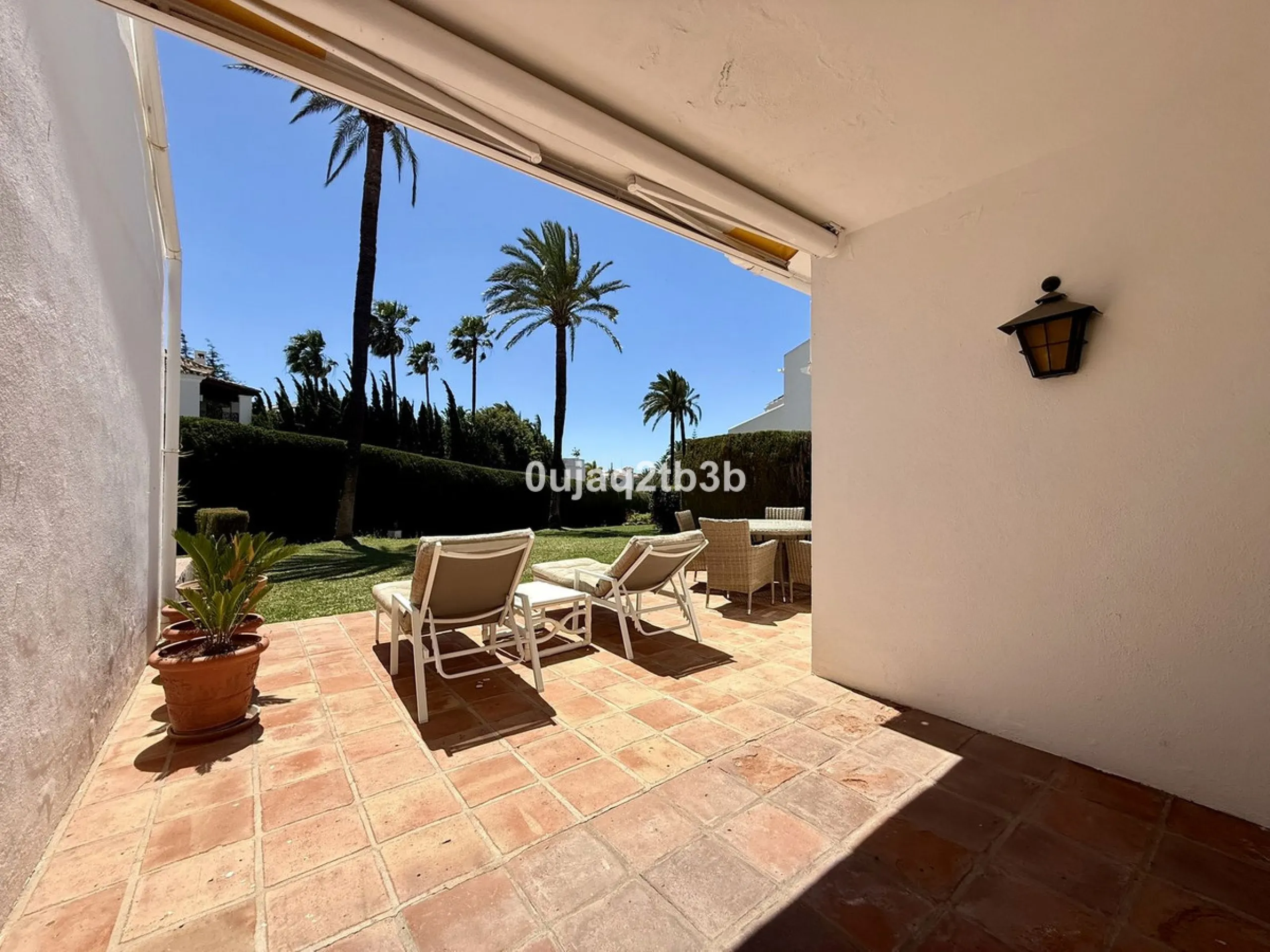 Exclusive Ground Floor Apartment with Garden in Nueva Andalucía, Steps from Puerto Banús