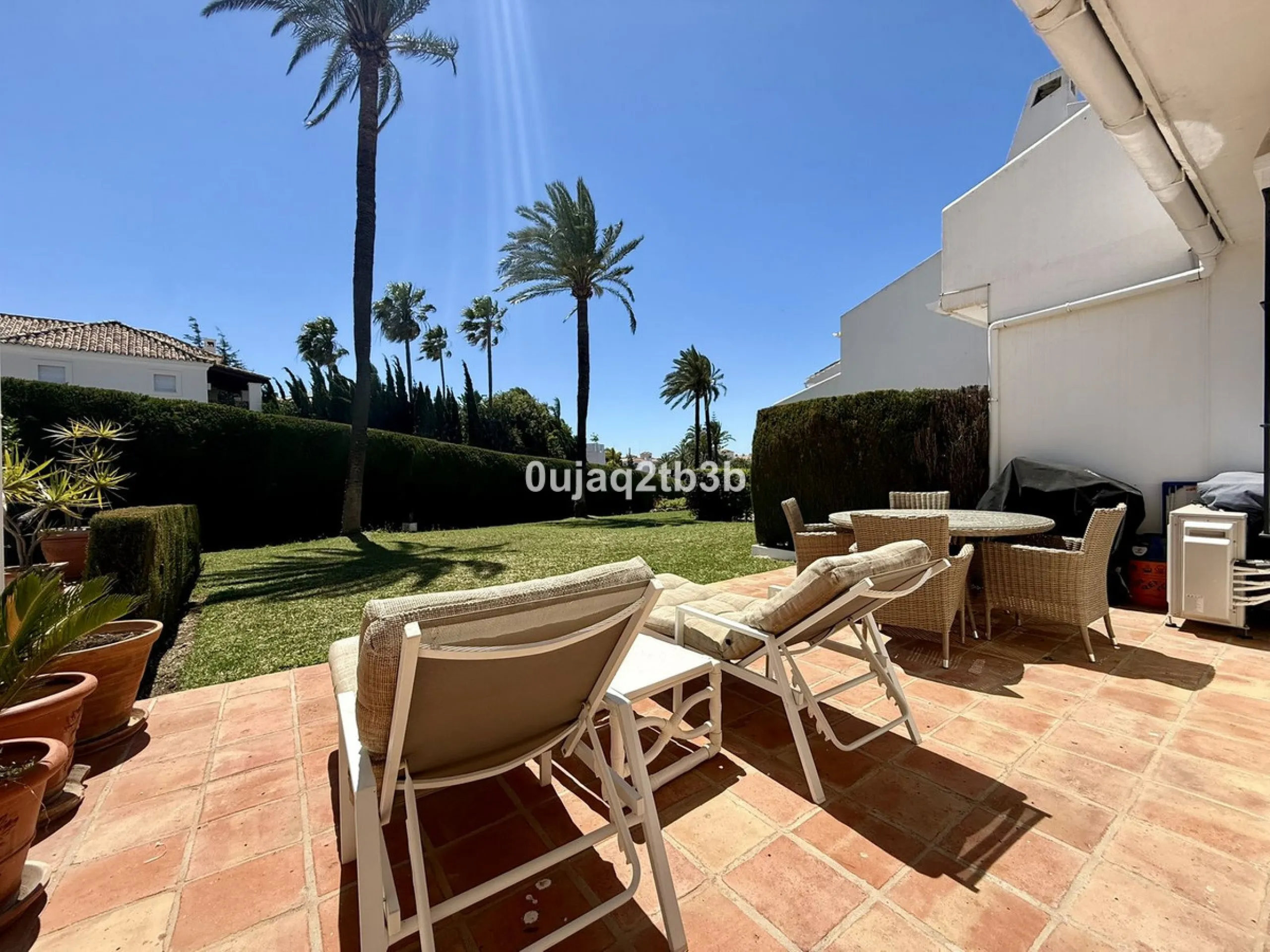 Exclusive Ground Floor Apartment with Garden in Nueva Andalucía, Steps from Puerto Banús