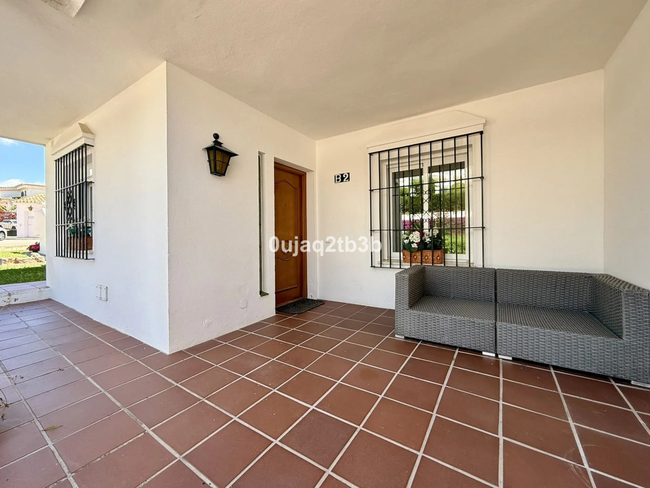 Exclusive Ground Floor Apartment with Garden in Nueva Andalucía, Steps from Puerto Banús