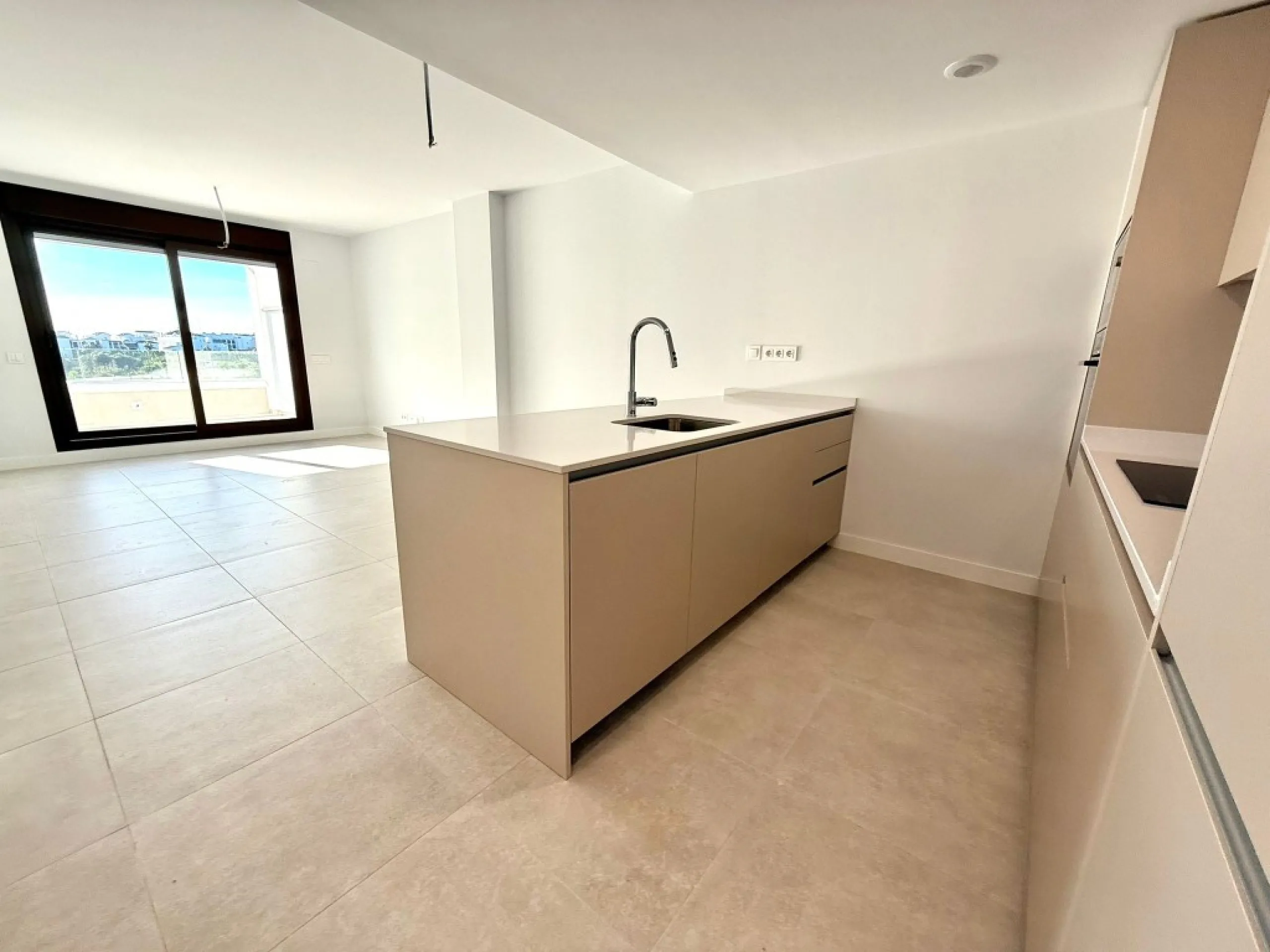 Beautiful brand new modern middle floor apartment with 2 bedrooms and 2 bathrooms with a large terrace with spectacular open views.
