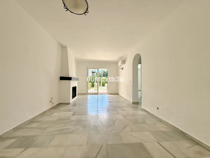 Exclusive Ground Floor Apartment with Garden in Nueva Andalucía, Steps from Puerto Banús