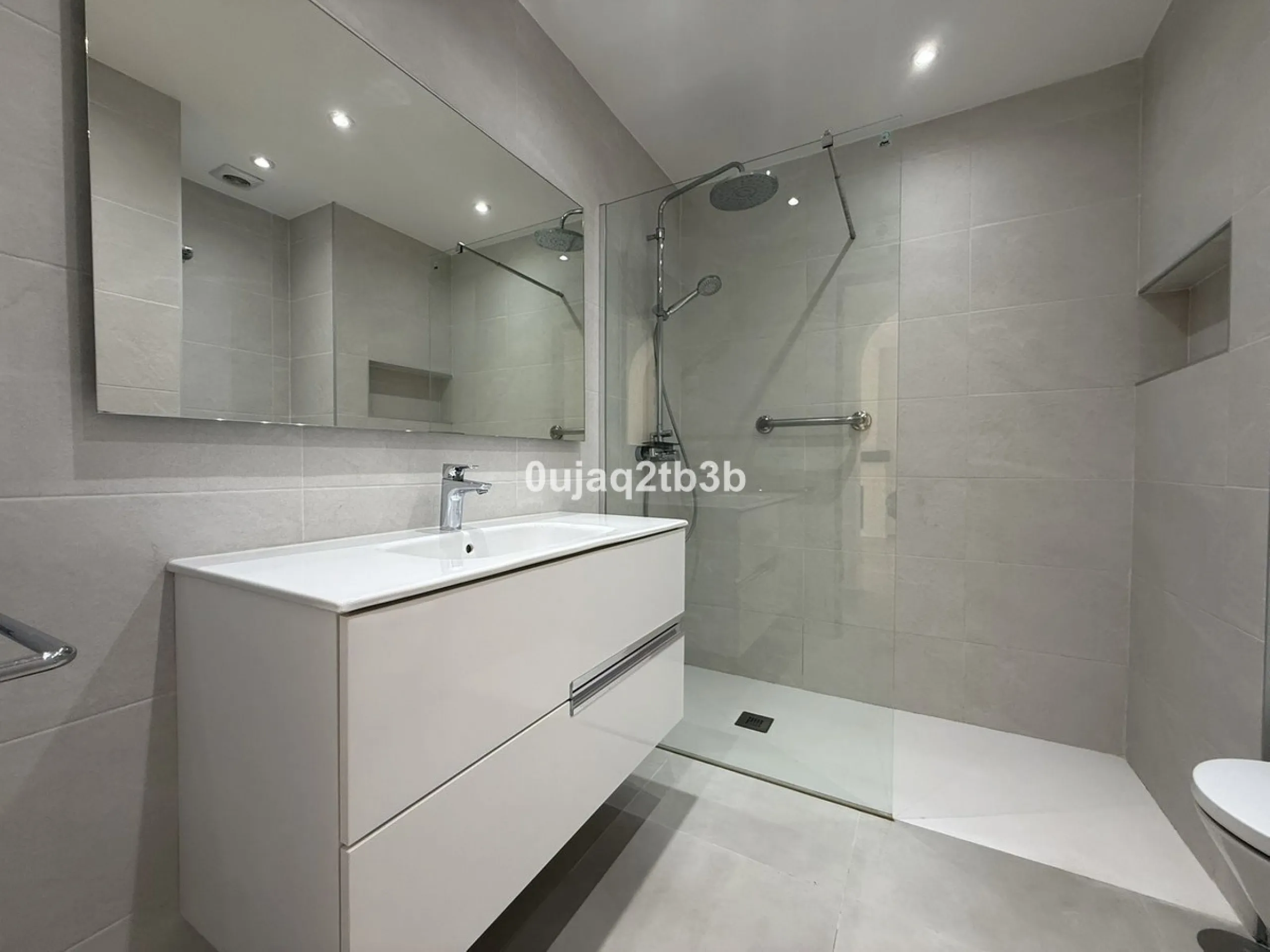 Exclusive Ground Floor Apartment with Garden in Nueva Andalucía, Steps from Puerto Banús