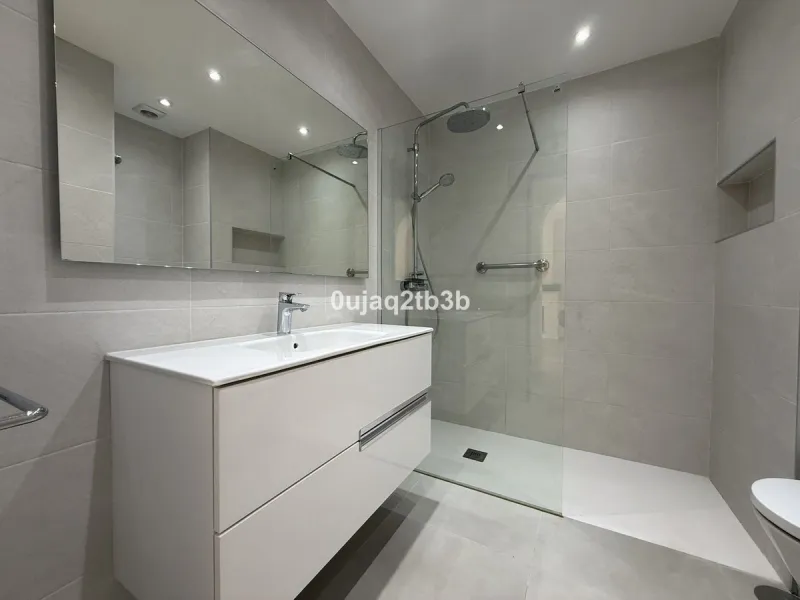 Exclusive Ground Floor Apartment with Garden in Nueva Andalucía, Steps from Puerto Banús