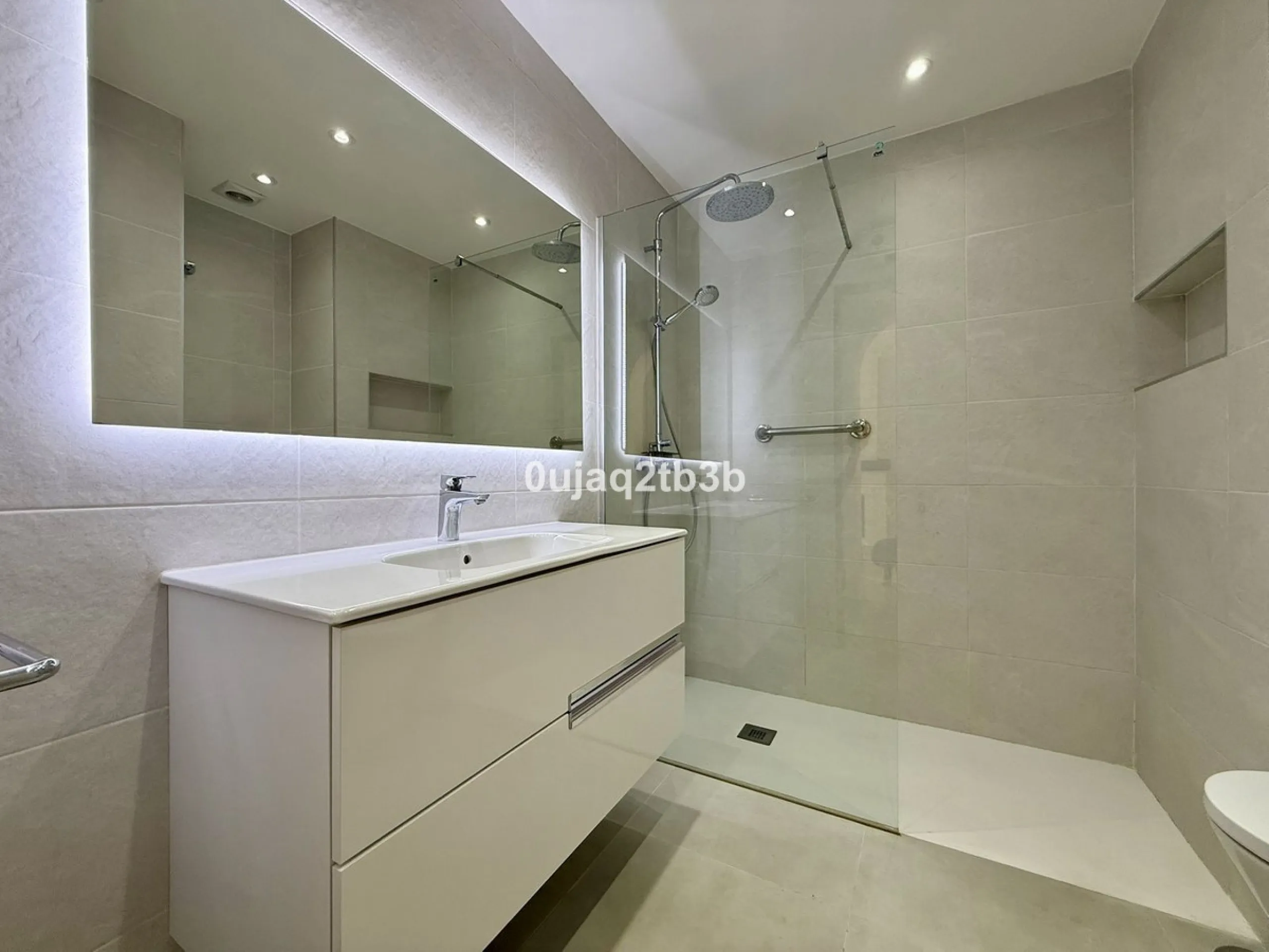 Exclusive Ground Floor Apartment with Garden in Nueva Andalucía, Steps from Puerto Banús