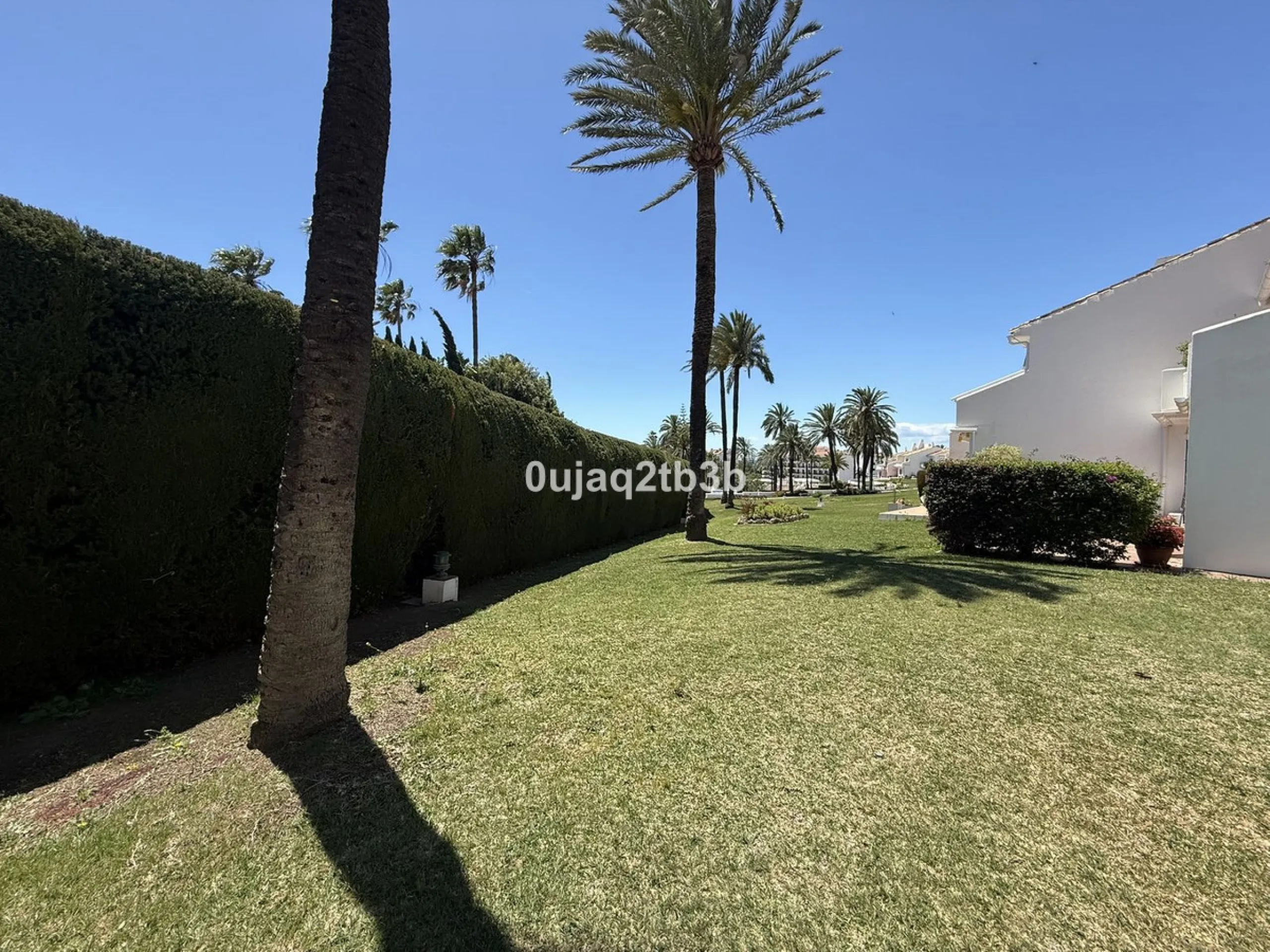 Exclusive Ground Floor Apartment with Garden in Nueva Andalucía, Steps from Puerto Banús
