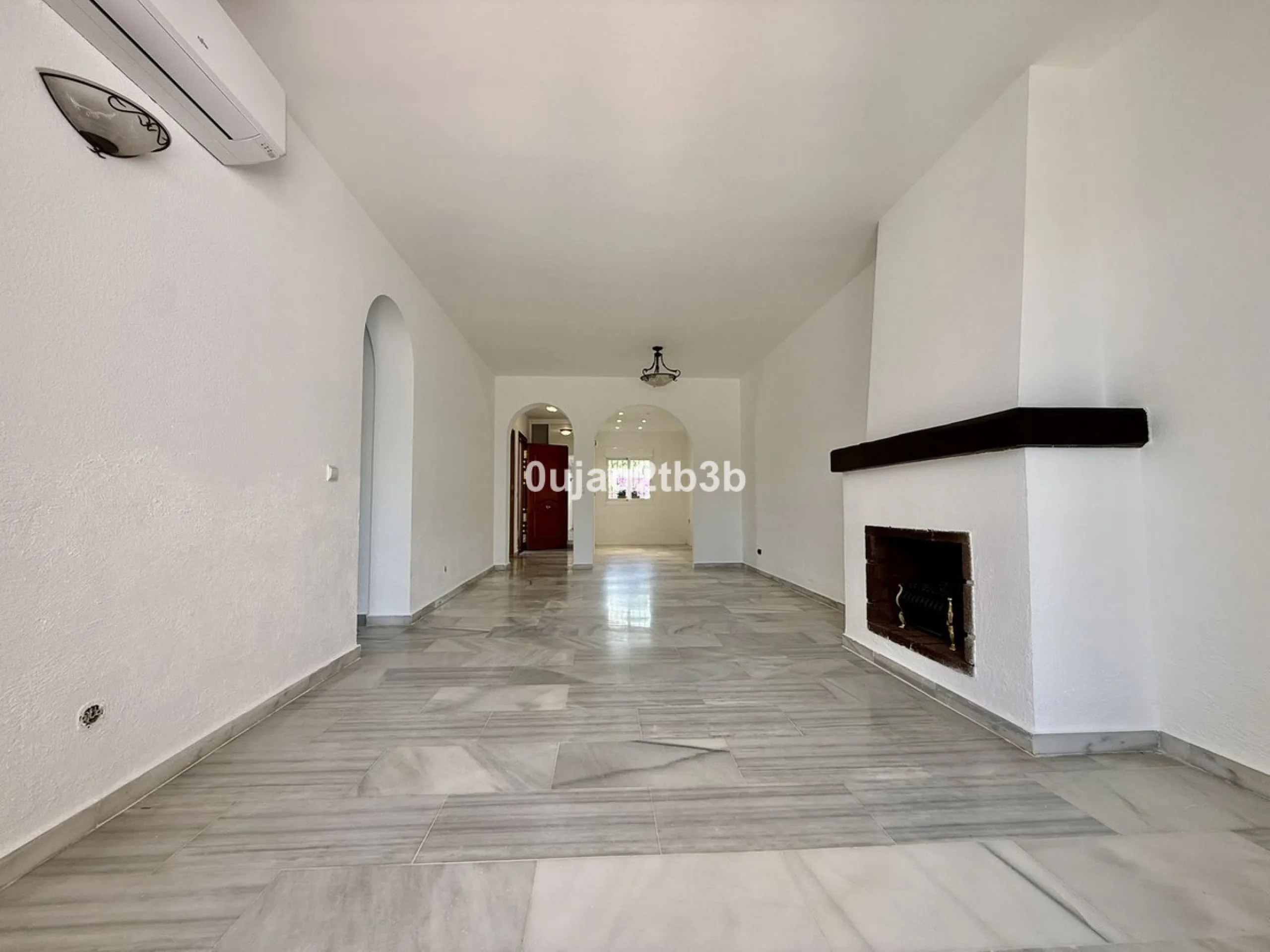 Exclusive Ground Floor Apartment with Garden in Nueva Andalucía, Steps from Puerto Banús