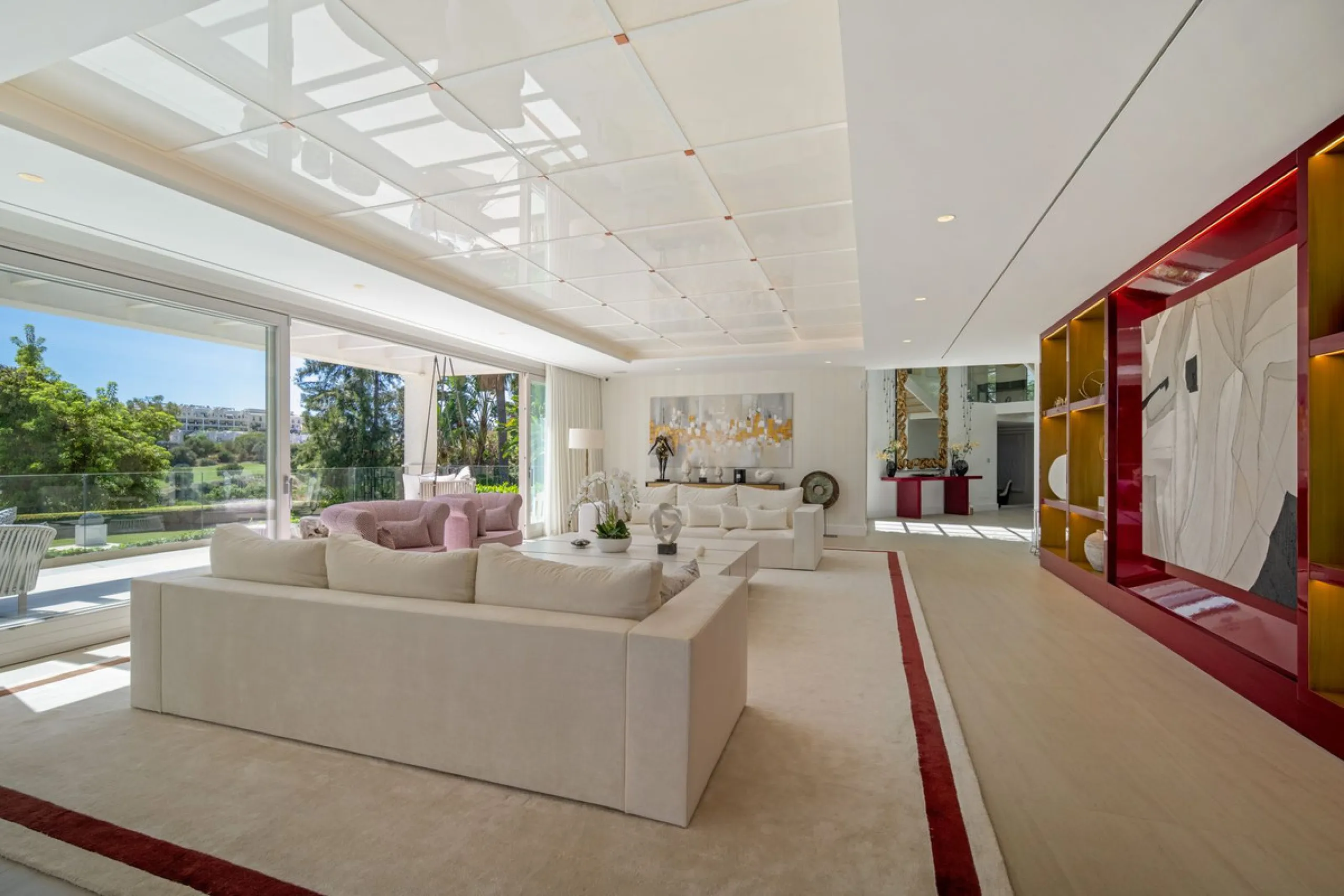 Aloha 40 is a private oasis nestled in the luxurious Aloha area of Marbella's Golf Valley. This magnificent mansion sits in a prestigious gated community and boasts an enviable front-line position overlooking Aloha Golf Course. Its timeless exterior and t