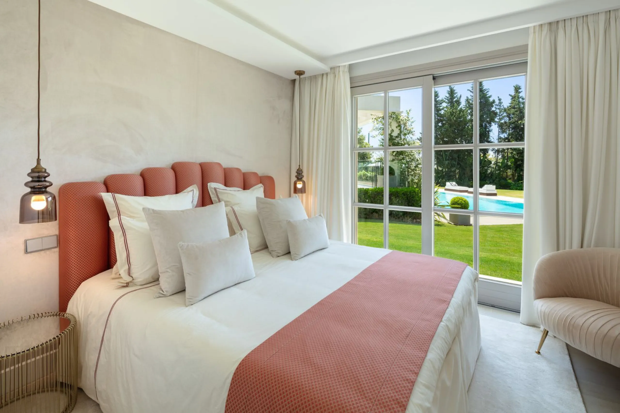 Aloha 40 is a private oasis nestled in the luxurious Aloha area of Marbella's Golf Valley. This magnificent mansion sits in a prestigious gated community and boasts an enviable front-line position overlooking Aloha Golf Course. Its timeless exterior and t