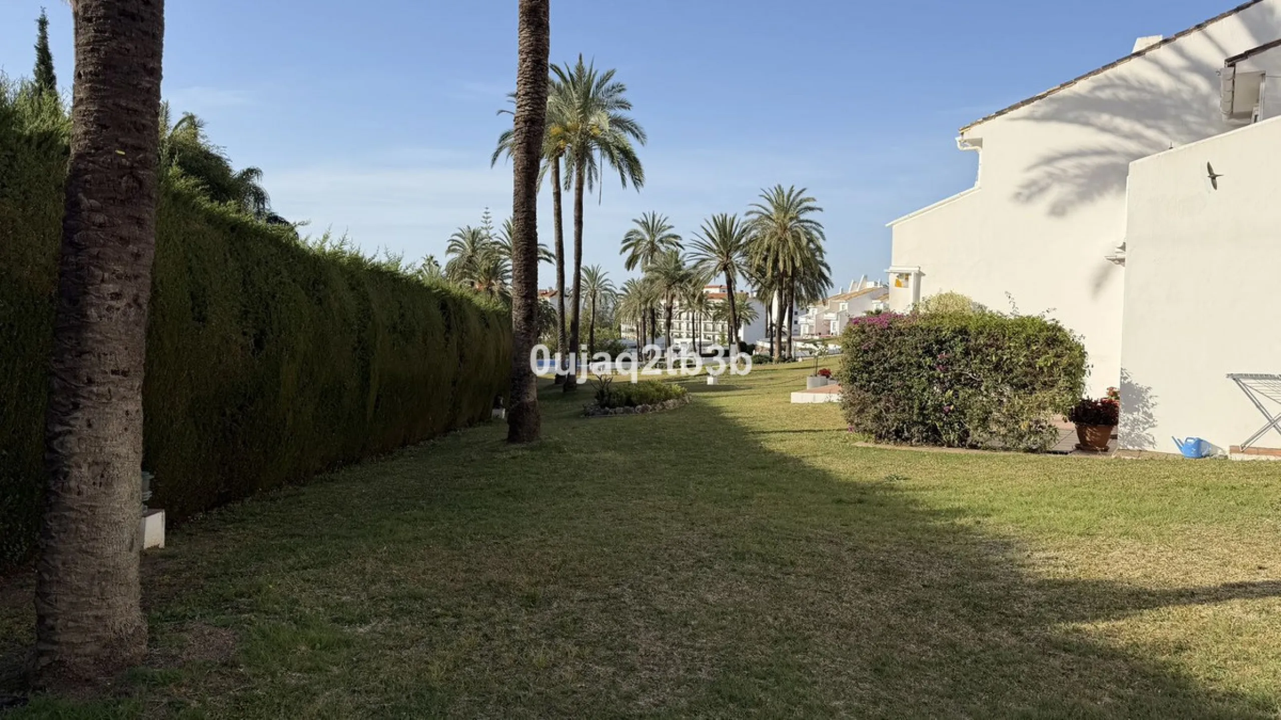 Exclusive Ground Floor Apartment with Garden in Nueva Andalucía, Steps from Puerto Banús