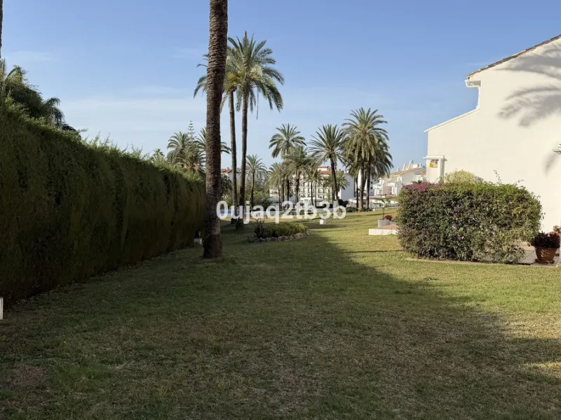 Exclusive Ground Floor Apartment with Garden in Nueva Andalucía, Steps from Puerto Banús
