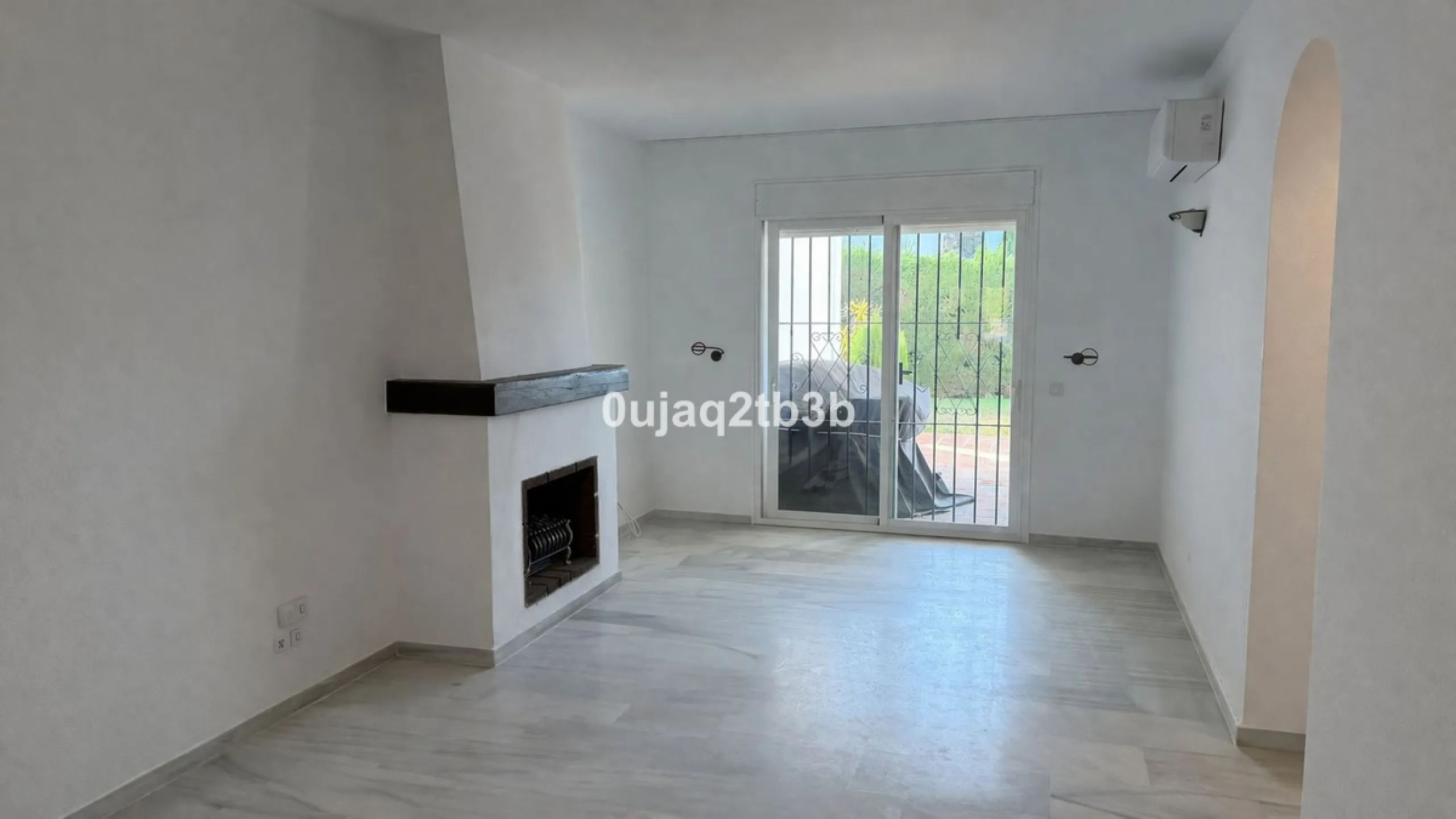 Exclusive Ground Floor Apartment with Garden in Nueva Andalucía, Steps from Puerto Banús