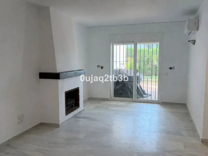 Exclusive Ground Floor Apartment with Garden in Nueva Andalucía, Steps from Puerto Banús