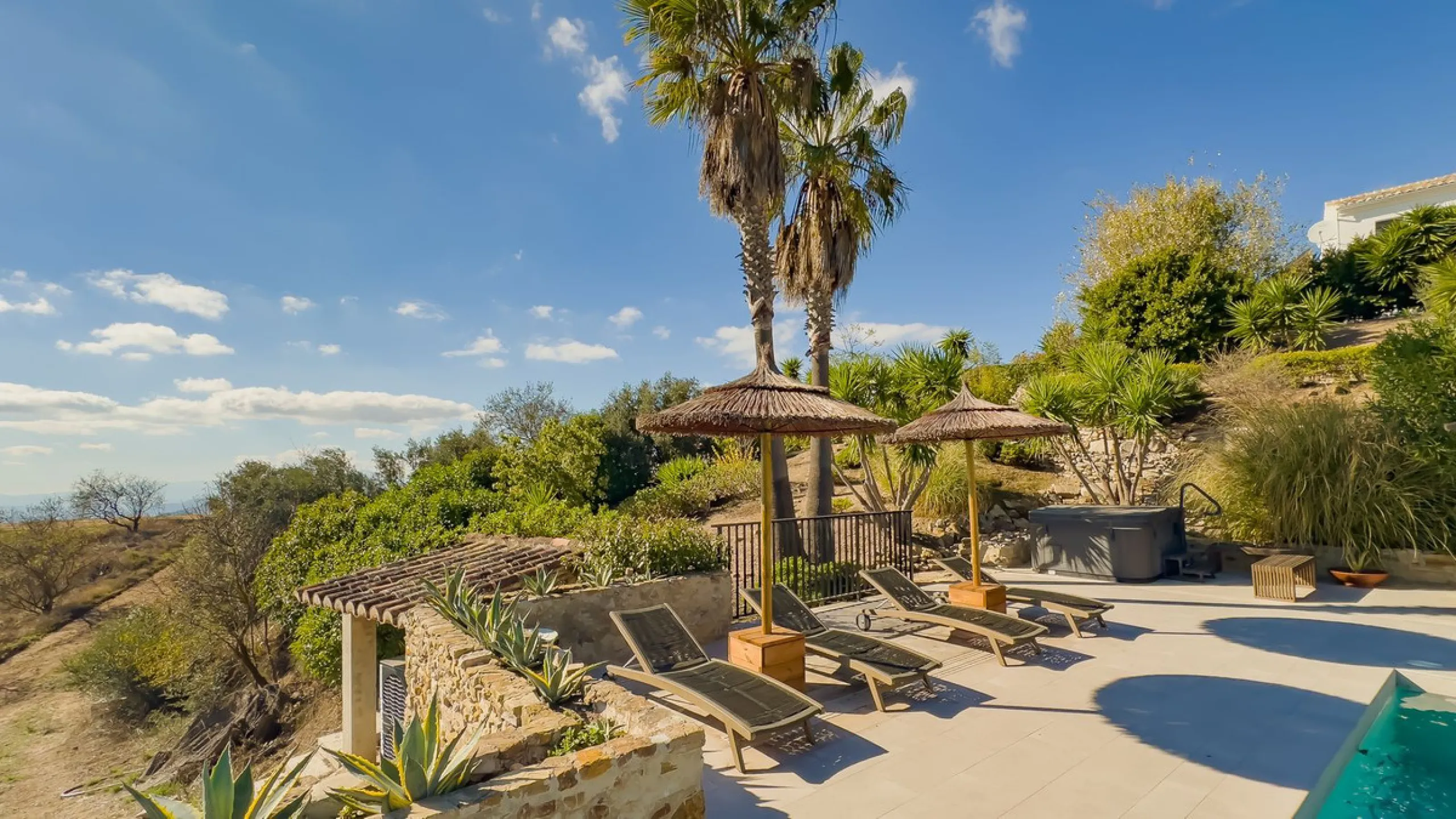 This exceptional Andalusian estate, located in the charming village of Villanueva de la Concepción, offers a rare combination of space, privacy, and breathtaking surroundings. The main residence includes 11 beautifully renovated bedrooms, comfortably acco