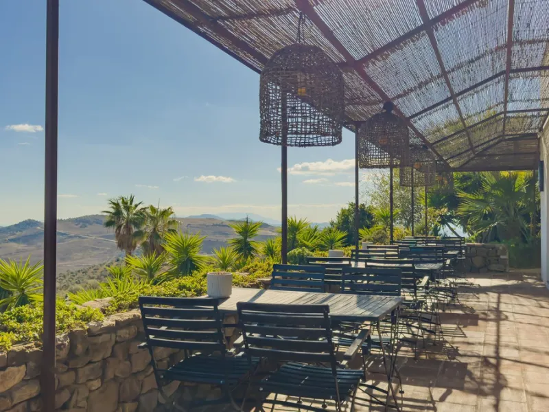 This exceptional Andalusian estate, located in the charming village of Villanueva de la Concepción, offers a rare combination of space, privacy, and breathtaking surroundings. The main residence includes 11 beautifully renovated bedrooms, comfortably acco
