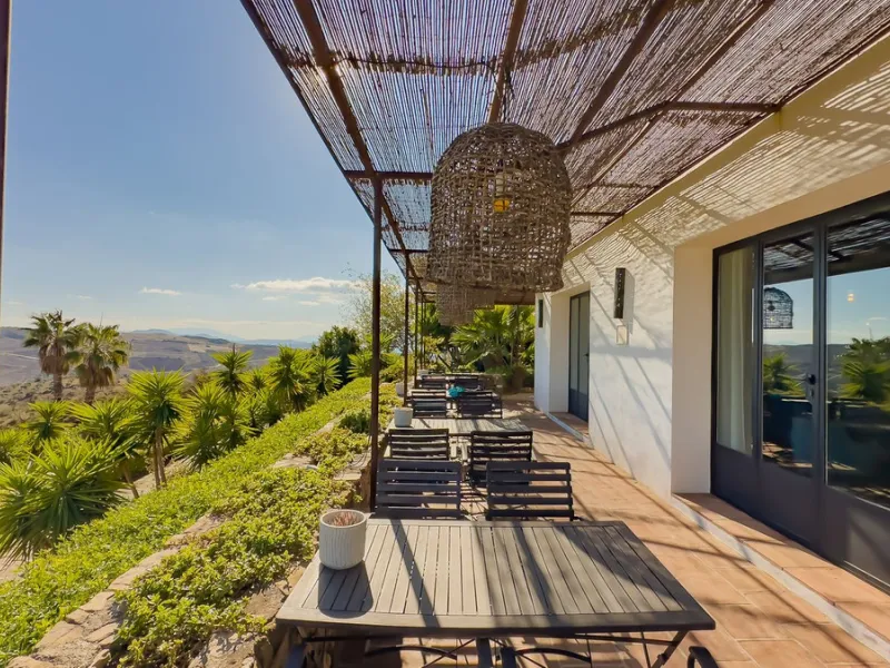 This exceptional Andalusian estate, located in the charming village of Villanueva de la Concepción, offers a rare combination of space, privacy, and breathtaking surroundings. The main residence includes 11 beautifully renovated bedrooms, comfortably acco