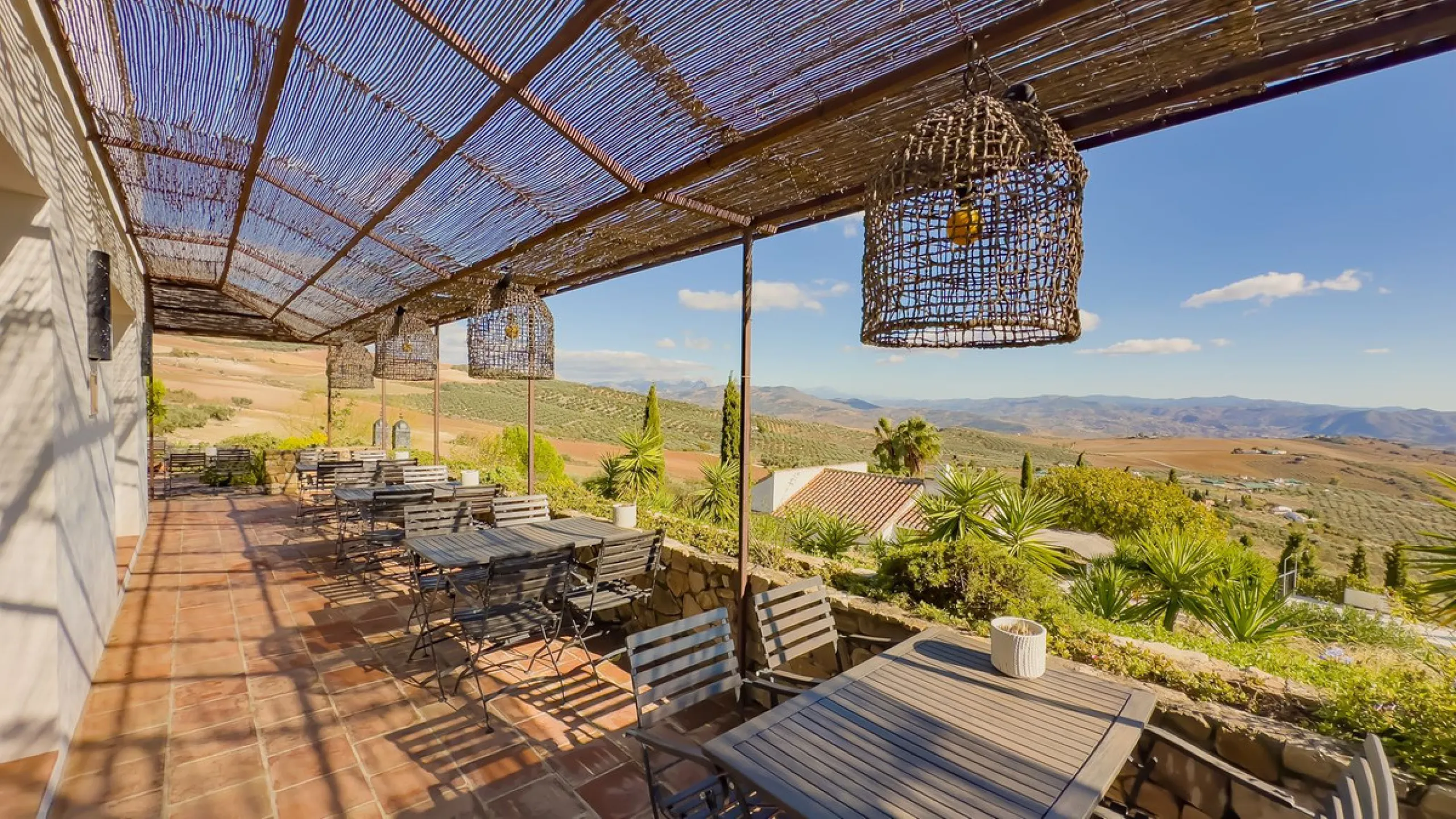 This exceptional Andalusian estate, located in the charming village of Villanueva de la Concepción, offers a rare combination of space, privacy, and breathtaking surroundings. The main residence includes 11 beautifully renovated bedrooms, comfortably acco