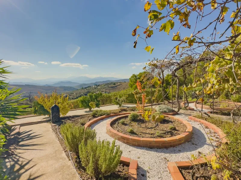 This exceptional Andalusian estate, located in the charming village of Villanueva de la Concepción, offers a rare combination of space, privacy, and breathtaking surroundings. The main residence includes 11 beautifully renovated bedrooms, comfortably acco