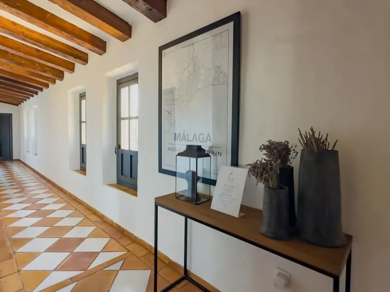 This exceptional Andalusian estate, located in the charming village of Villanueva de la Concepción, offers a rare combination of space, privacy, and breathtaking surroundings. The main residence includes 11 beautifully renovated bedrooms, comfortably acco