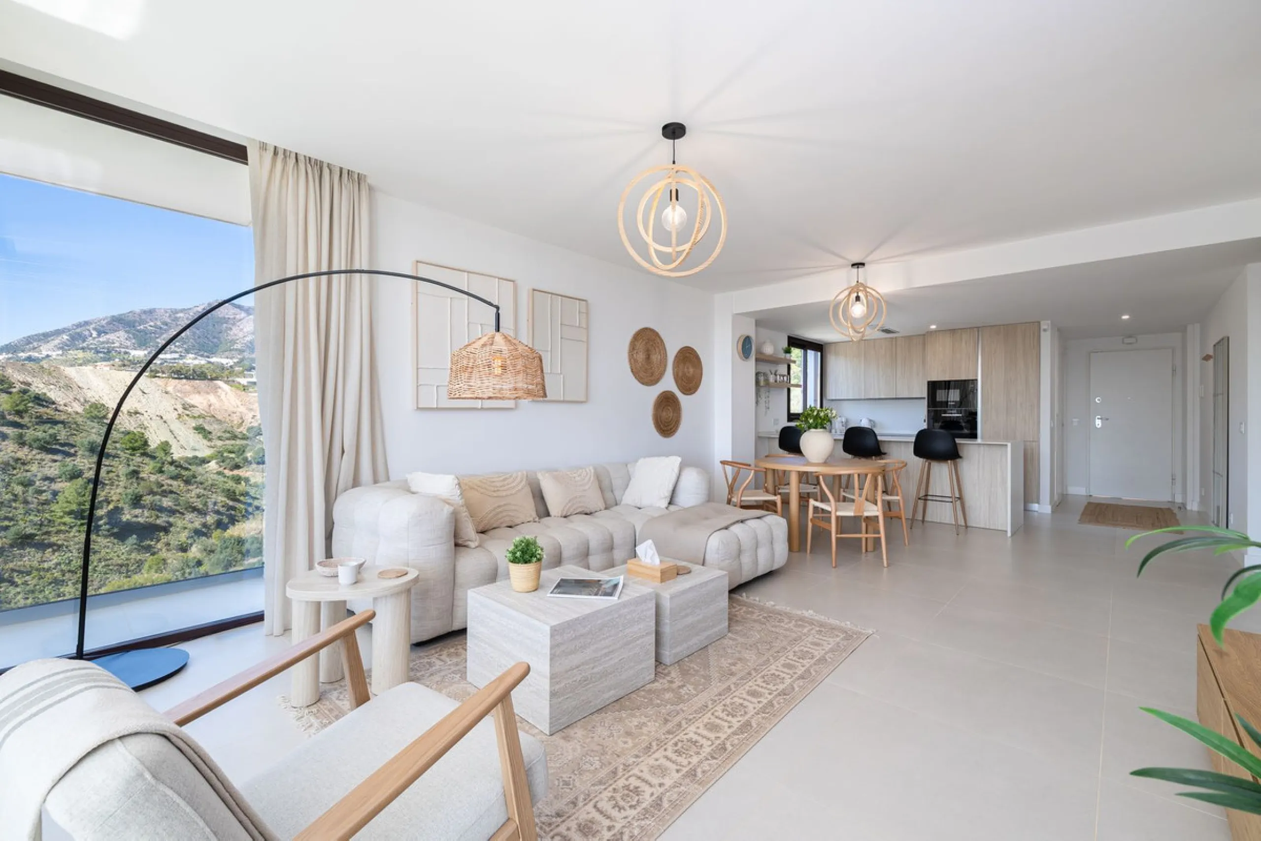 Finding the perfect balance between coastal serenity and modern luxury is effortless in this stunning corner residence, located in the highly sought-after lower enclave of El Higuerón, Fuengirola. This exceptionally spacious and luminous home is designed 