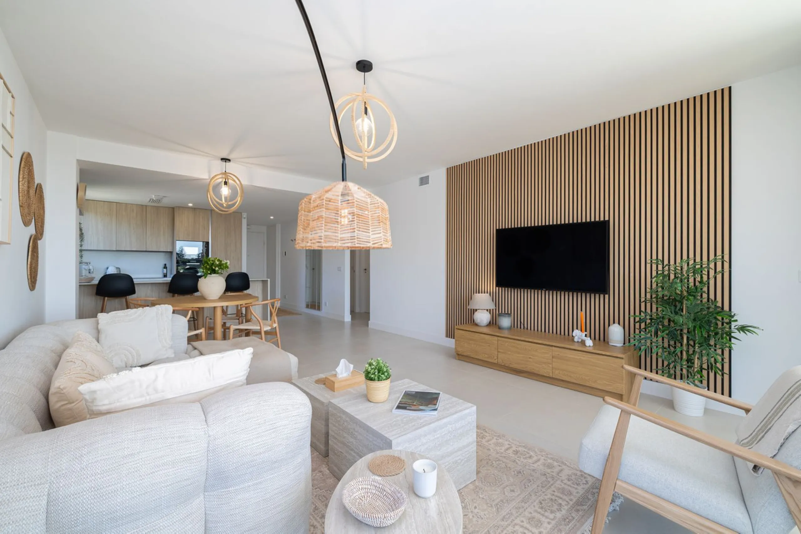 Finding the perfect balance between coastal serenity and modern luxury is effortless in this stunning corner residence, located in the highly sought-after lower enclave of El Higuerón, Fuengirola. This exceptionally spacious and luminous home is designed 