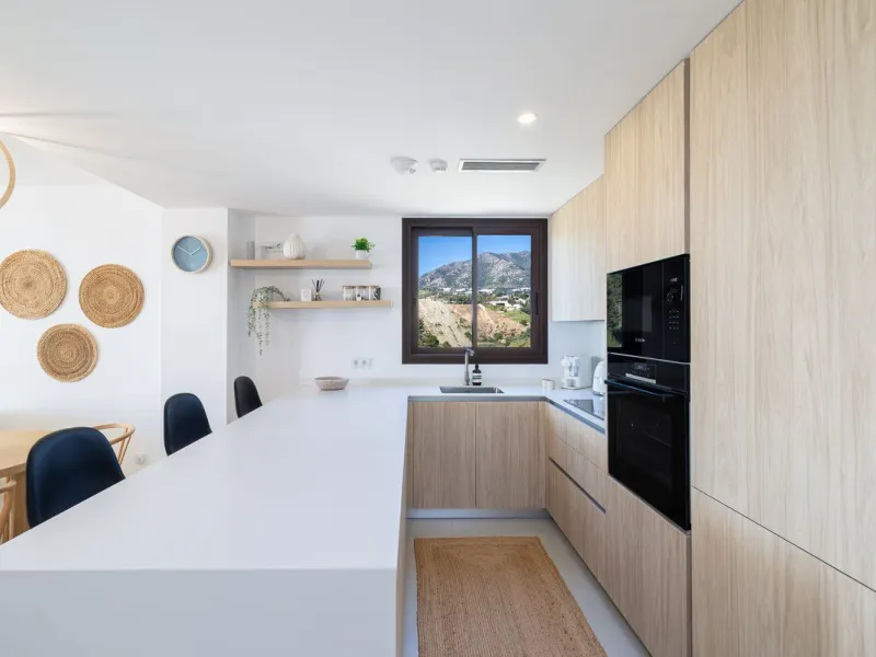 Finding the perfect balance between coastal serenity and modern luxury is effortless in this stunning corner residence, located in the highly sought-after lower enclave of El Higuerón, Fuengirola. This exceptionally spacious and luminous home is designed 