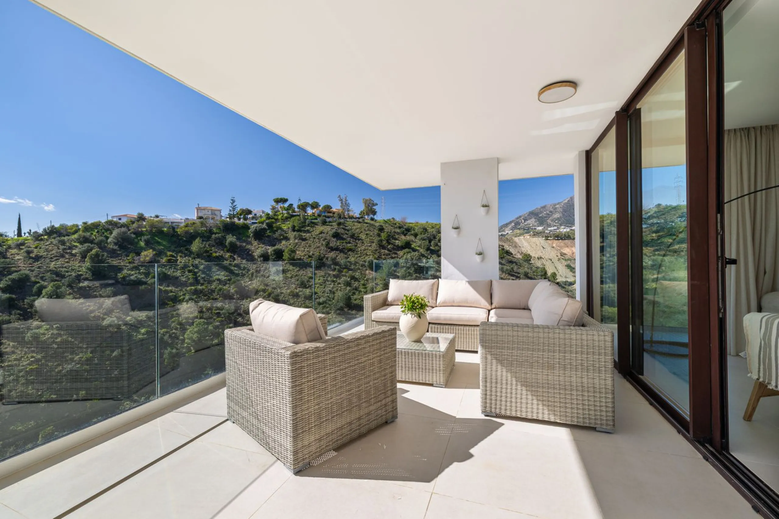 Finding the perfect balance between coastal serenity and modern luxury is effortless in this stunning corner residence, located in the highly sought-after lower enclave of El Higuerón, Fuengirola. This exceptionally spacious and luminous home is designed 