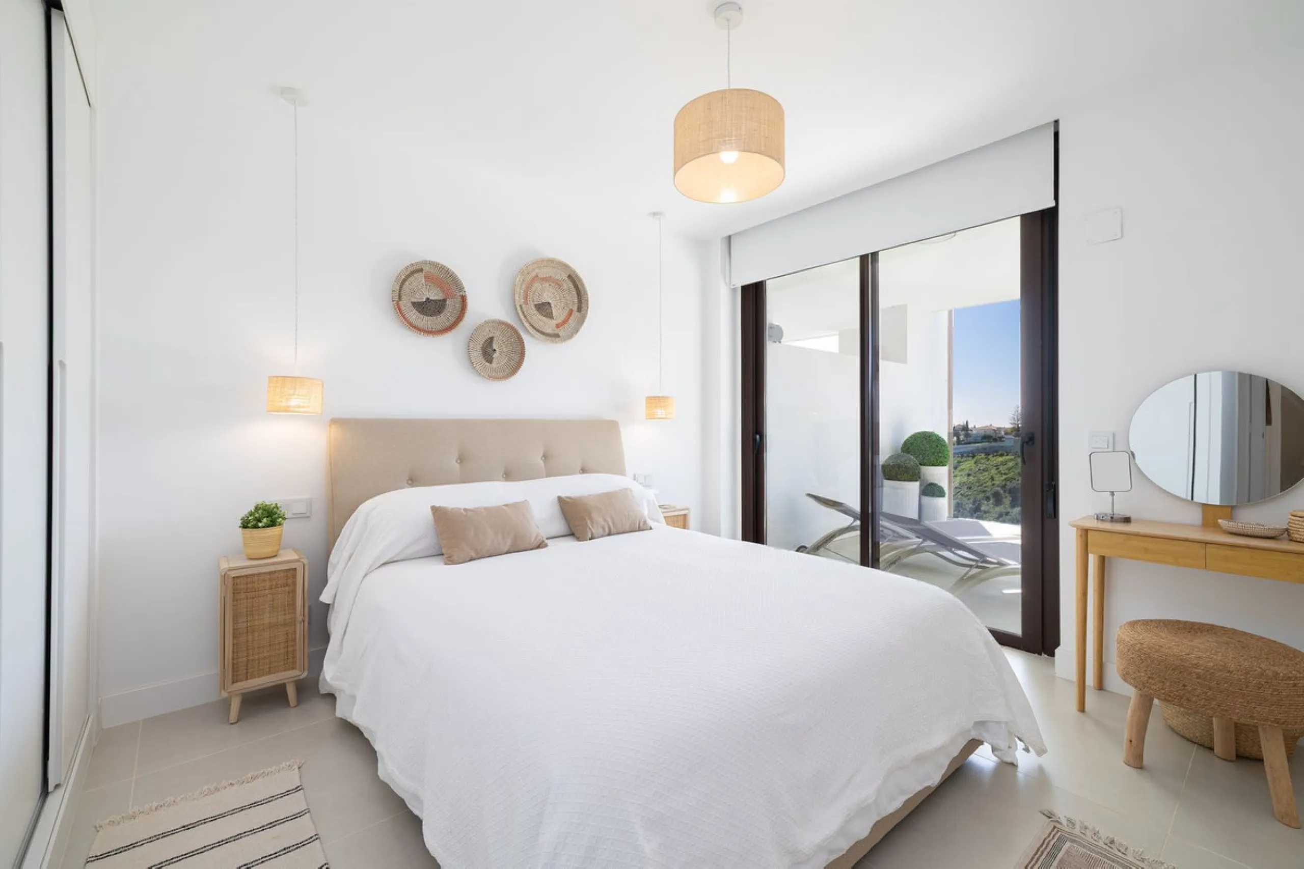 Finding the perfect balance between coastal serenity and modern luxury is effortless in this stunning corner residence, located in the highly sought-after lower enclave of El Higuerón, Fuengirola. This exceptionally spacious and luminous home is designed 