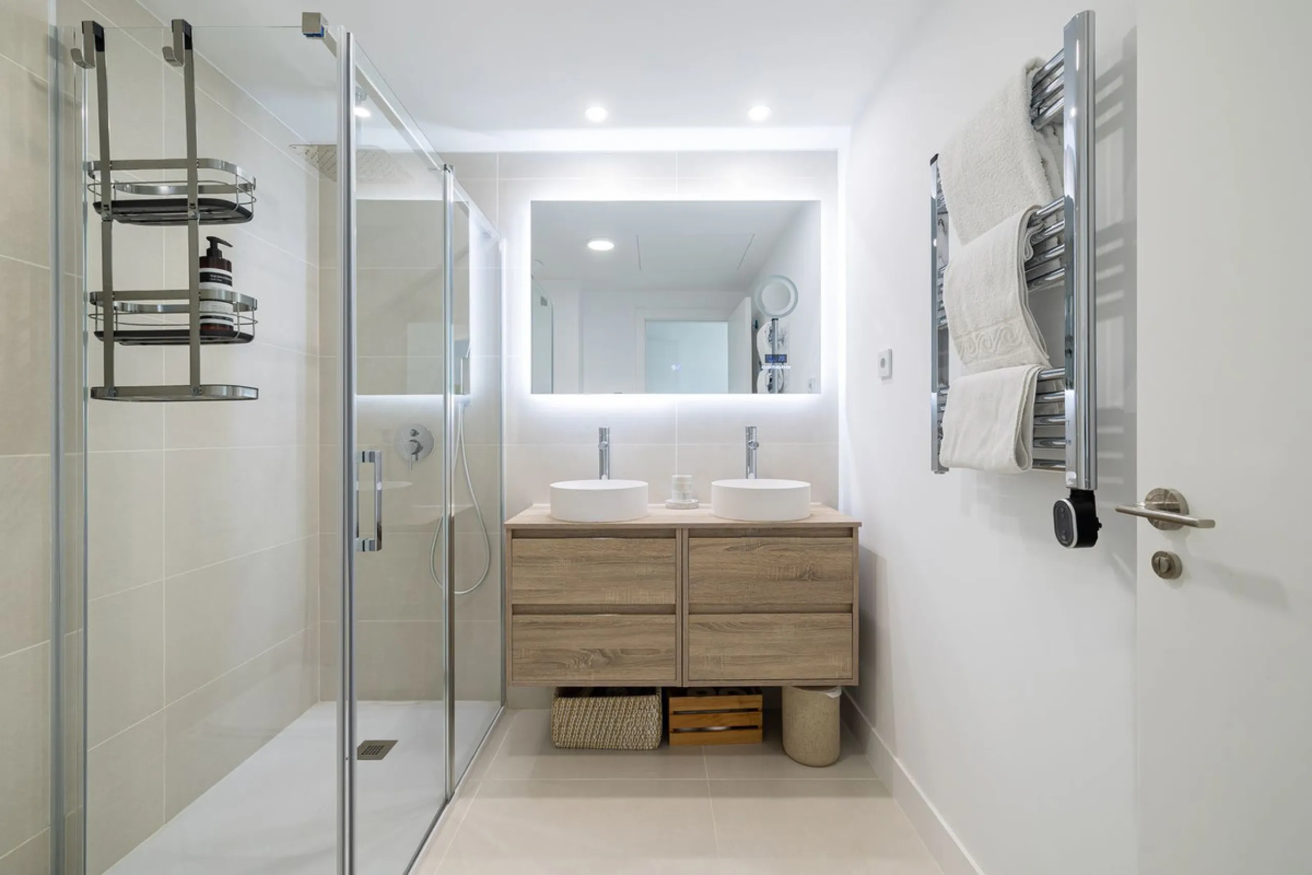 Finding the perfect balance between coastal serenity and modern luxury is effortless in this stunning corner residence, located in the highly sought-after lower enclave of El Higuerón, Fuengirola. This exceptionally spacious and luminous home is designed 