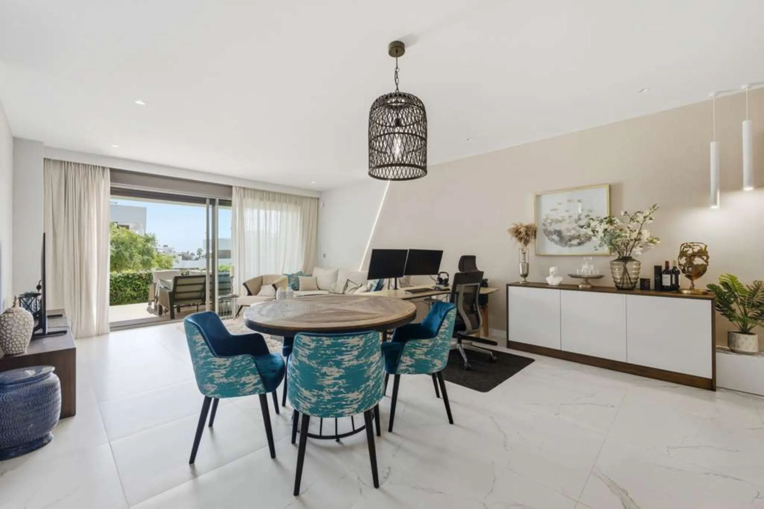 Set within the dynamic and increasingly sought-after residential quarter of Las Mesas in Estepona, this elegant elevated ground-floor apartment represents a rare convergence of urban accessibility, privacy, and long-term investment appeal. Positioned just
