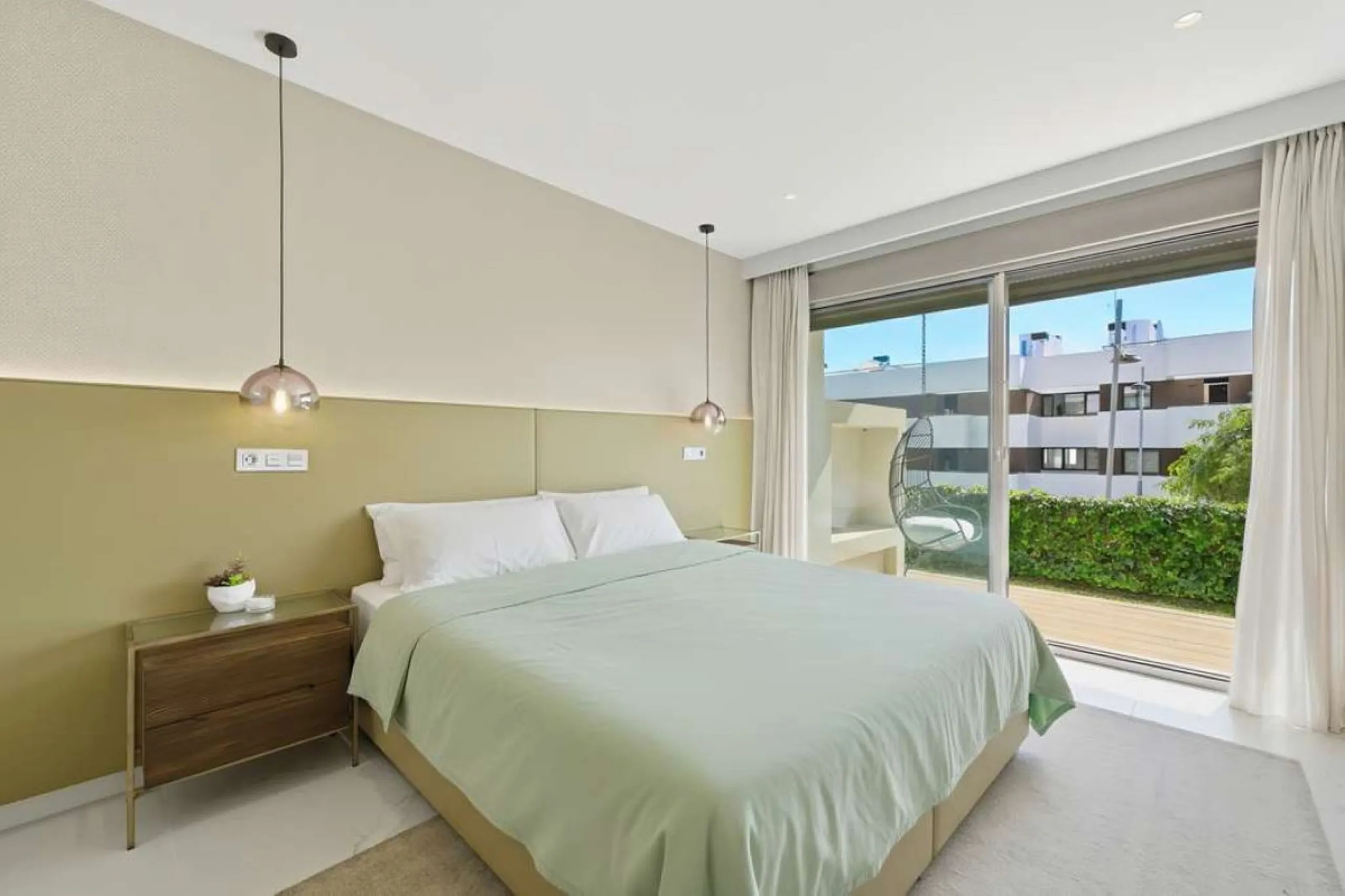 Set within the dynamic and increasingly sought-after residential quarter of Las Mesas in Estepona, this elegant elevated ground-floor apartment represents a rare convergence of urban accessibility, privacy, and long-term investment appeal. Positioned just
