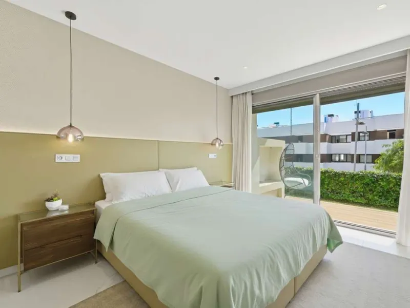 Set within the dynamic and increasingly sought-after residential quarter of Las Mesas in Estepona, this elegant elevated ground-floor apartment represents a rare convergence of urban accessibility, privacy, and long-term investment appeal. Positioned just
