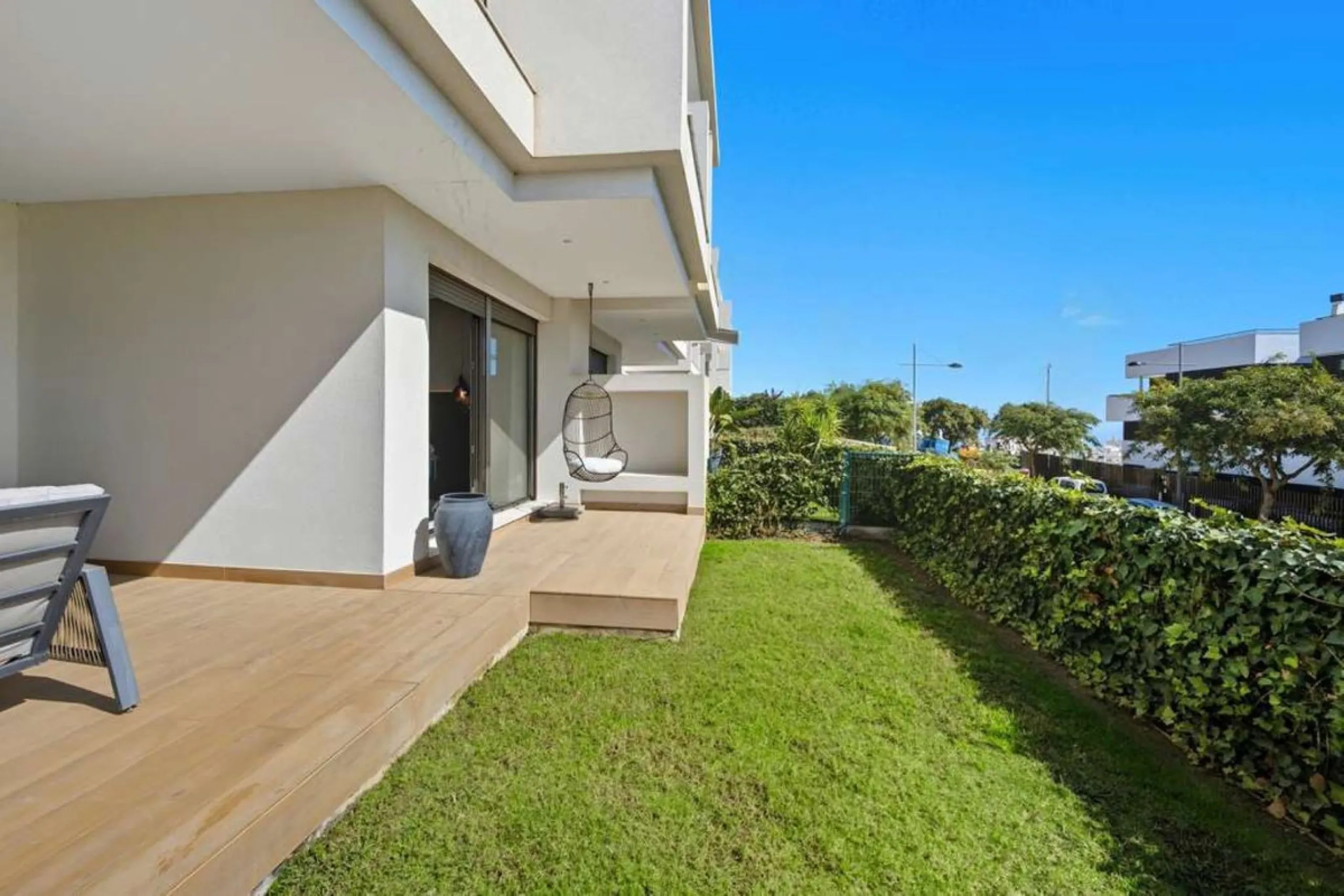 Set within the dynamic and increasingly sought-after residential quarter of Las Mesas in Estepona, this elegant elevated ground-floor apartment represents a rare convergence of urban accessibility, privacy, and long-term investment appeal. Positioned just