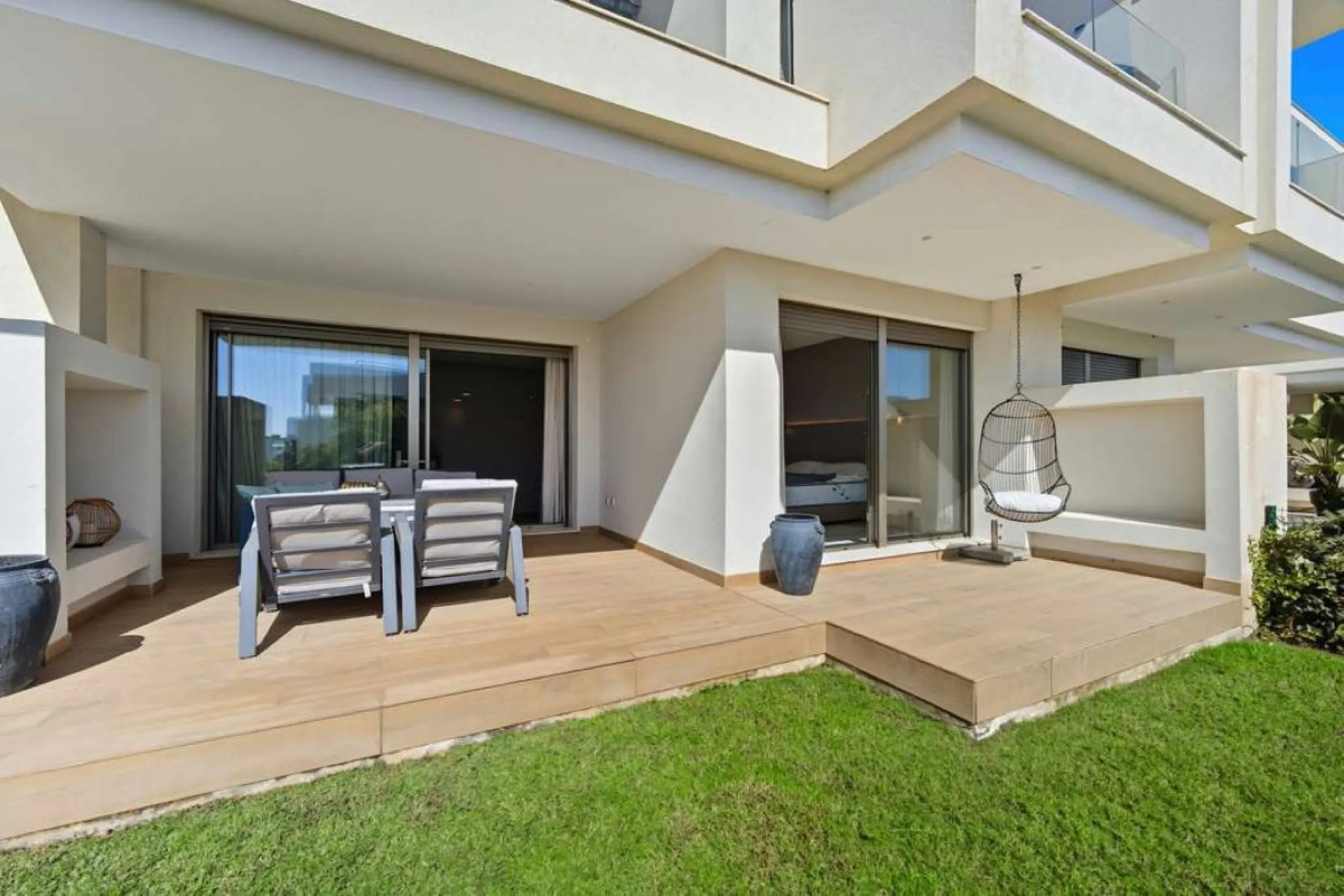 Set within the dynamic and increasingly sought-after residential quarter of Las Mesas in Estepona, this elegant elevated ground-floor apartment represents a rare convergence of urban accessibility, privacy, and long-term investment appeal. Positioned just