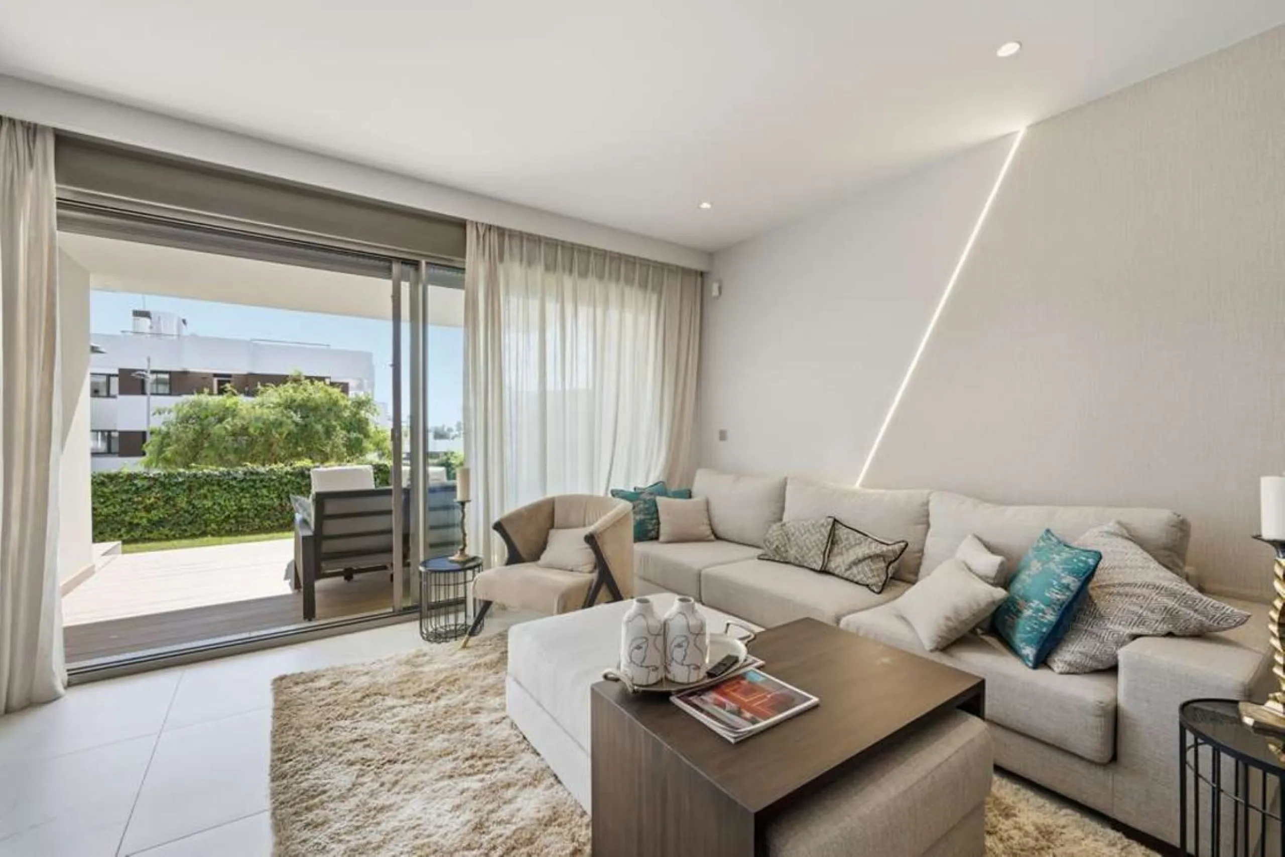 Set within the dynamic and increasingly sought-after residential quarter of Las Mesas in Estepona, this elegant elevated ground-floor apartment represents a rare convergence of urban accessibility, privacy, and long-term investment appeal. Positioned just