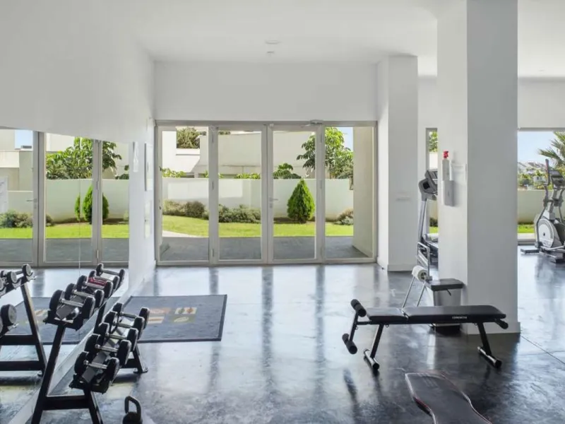 Set within the dynamic and increasingly sought-after residential quarter of Las Mesas in Estepona, this elegant elevated ground-floor apartment represents a rare convergence of urban accessibility, privacy, and long-term investment appeal. Positioned just
