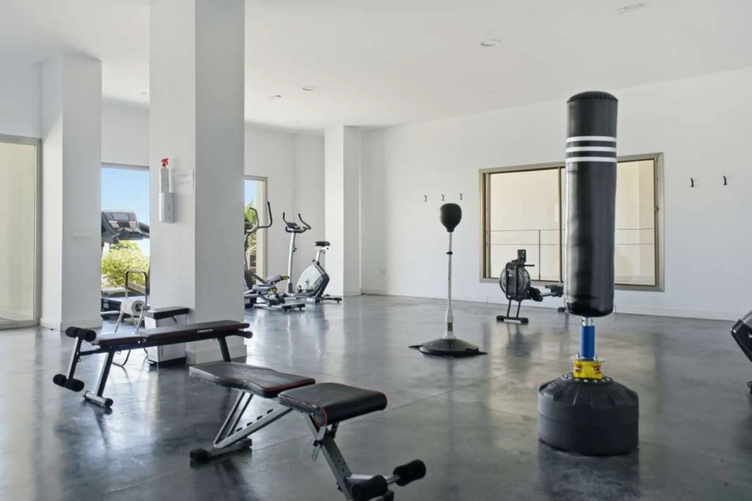 Set within the dynamic and increasingly sought-after residential quarter of Las Mesas in Estepona, this elegant elevated ground-floor apartment represents a rare convergence of urban accessibility, privacy, and long-term investment appeal. Positioned just