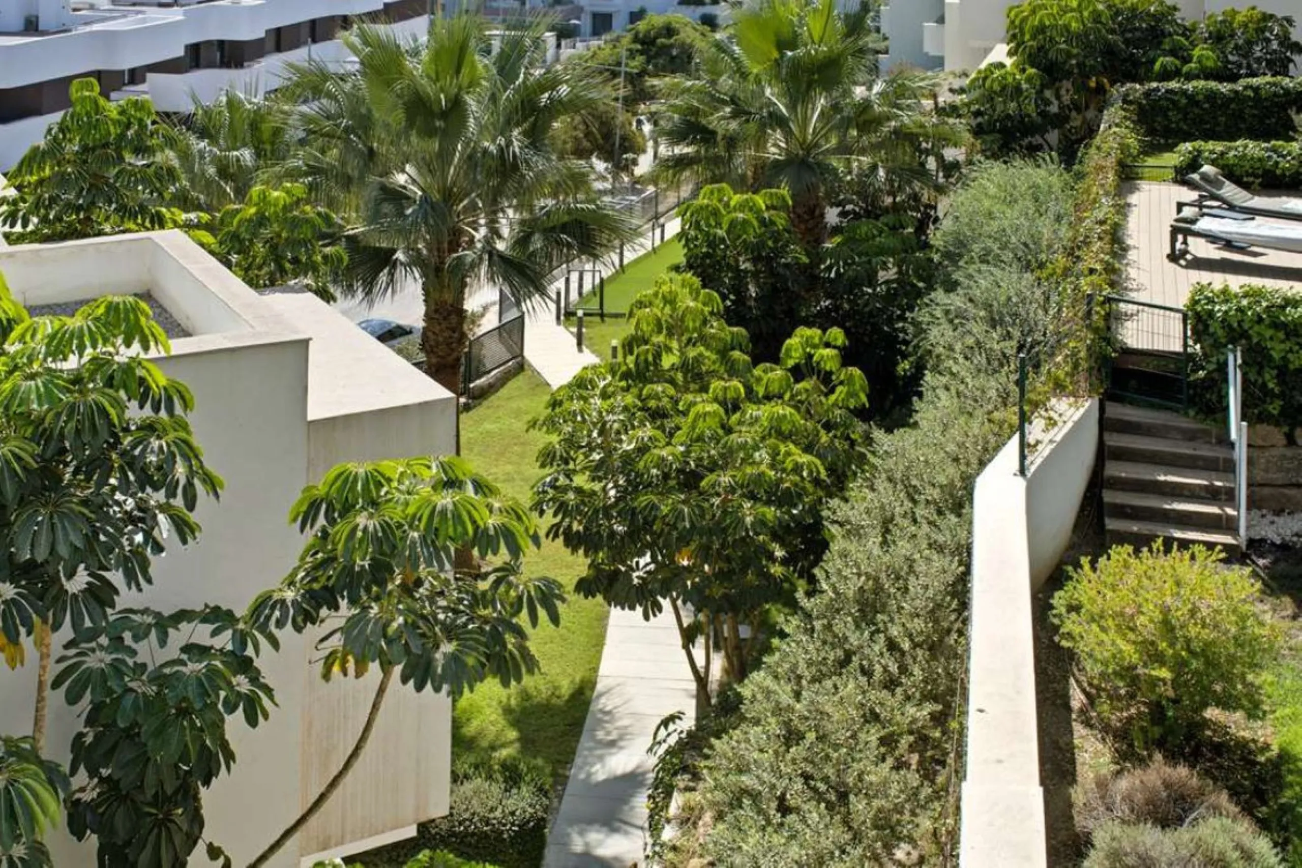 Set within the dynamic and increasingly sought-after residential quarter of Las Mesas in Estepona, this elegant elevated ground-floor apartment represents a rare convergence of urban accessibility, privacy, and long-term investment appeal. Positioned just