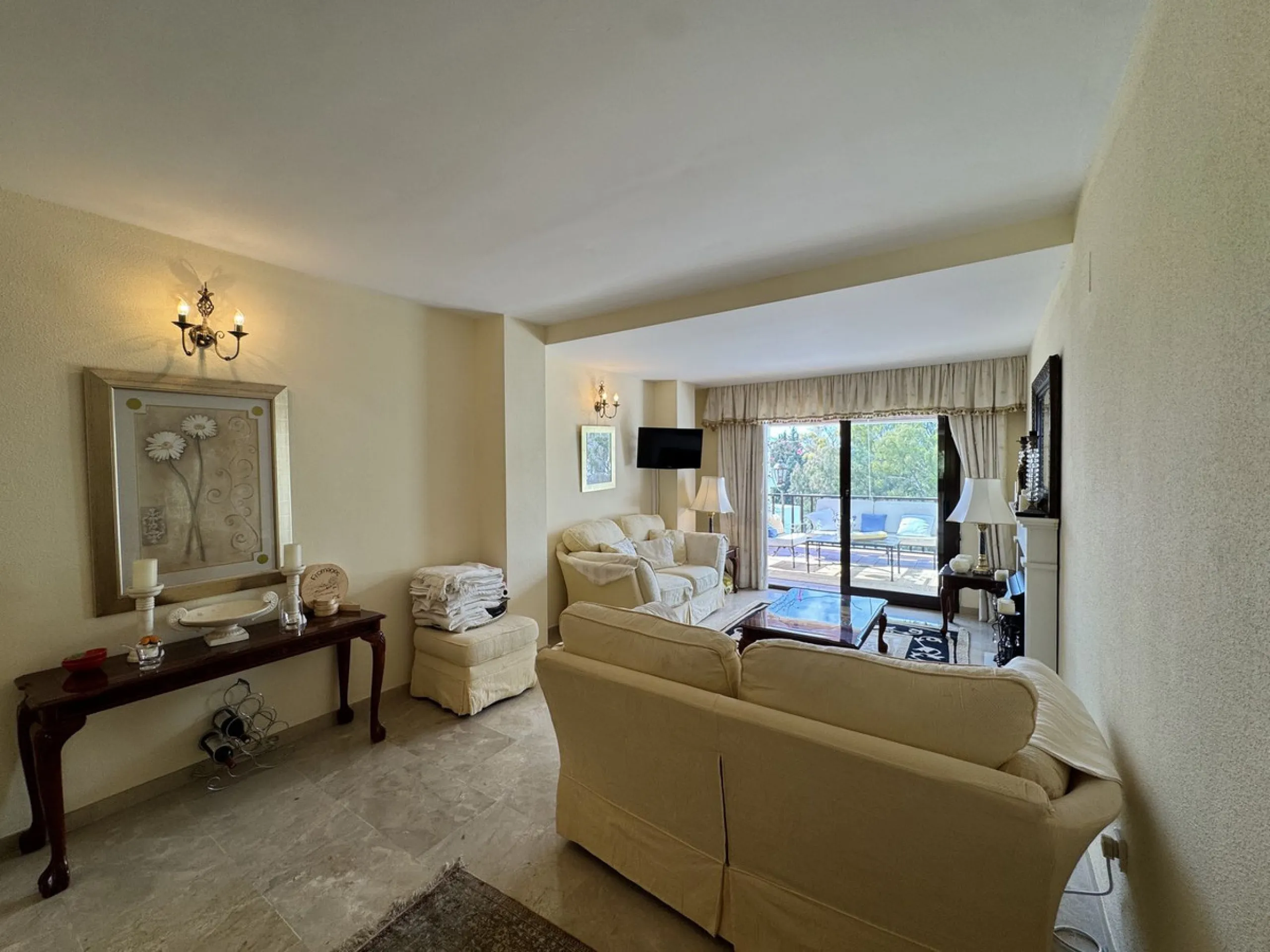 Located in the sought after Coto Real on the prestigious Marbella Golden Mile, this charming 2-bedroom, 2-bathroom apartment offers privacy, tranquility, and excellent potential in one of Marbella's most established gated communities.